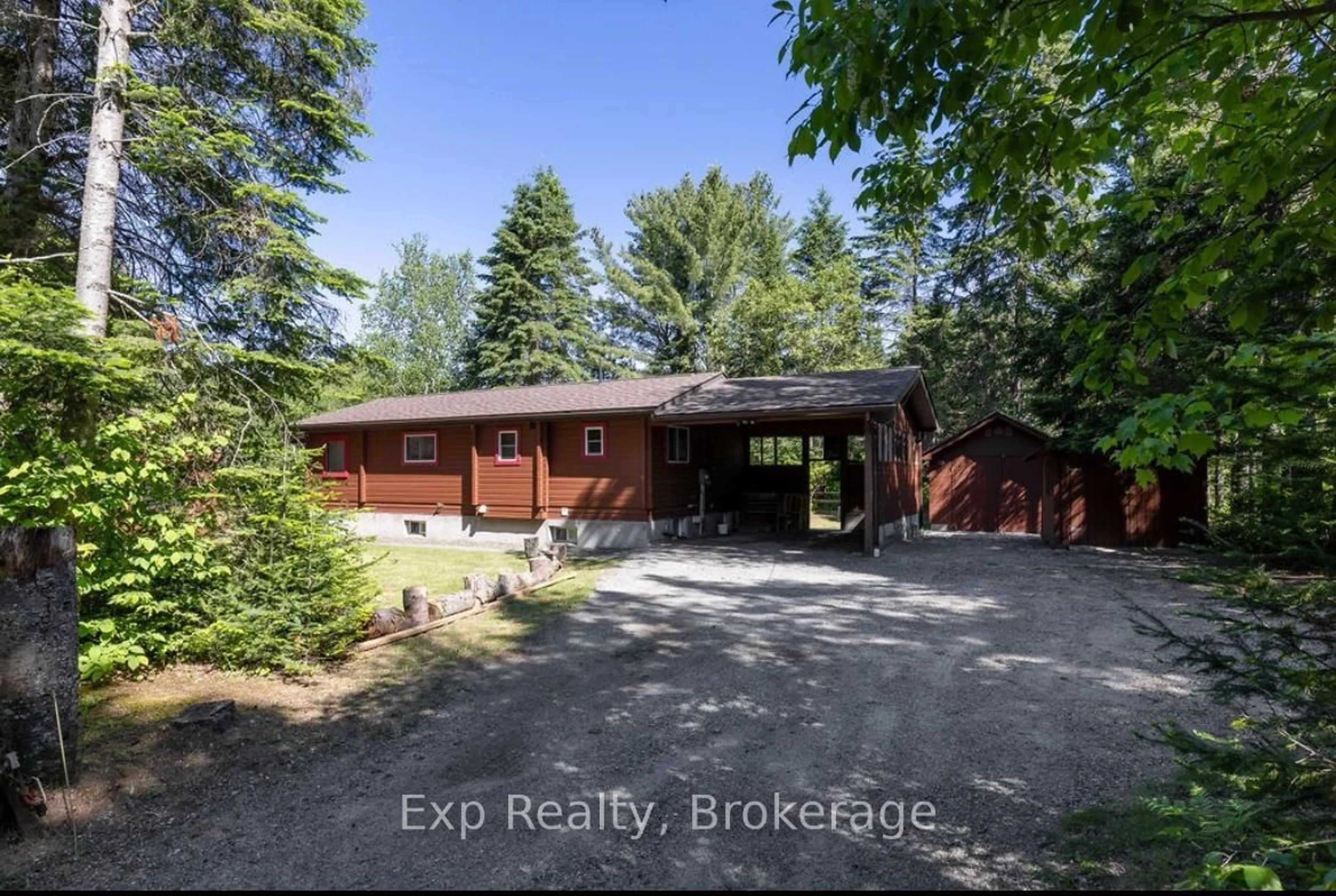 A pic from outside/outdoor area/front of a property/back of a property/a pic from drone, unknown for 27 Groeger Rd, Huntsville Ontario P1H 2J4