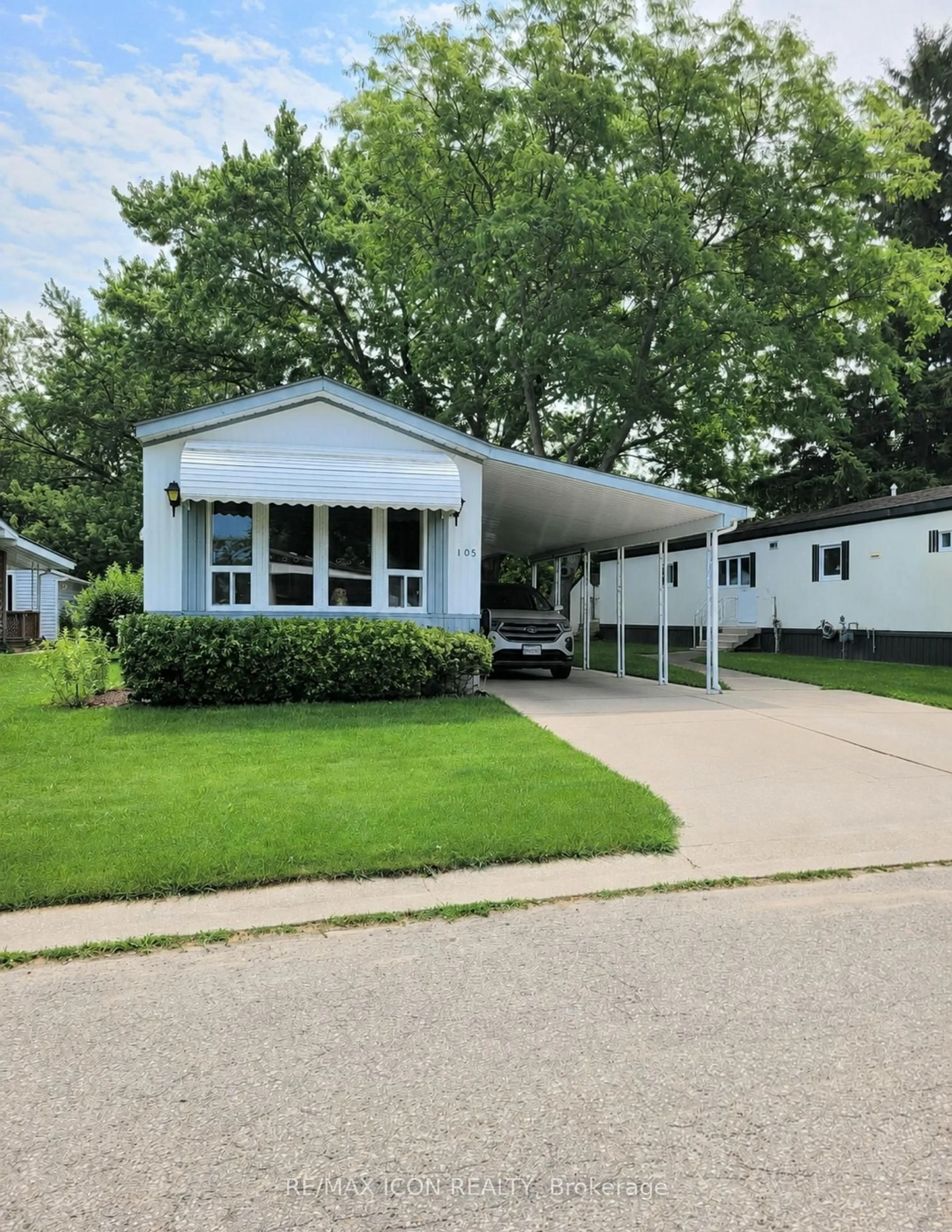 Home with vinyl exterior material, street for 1940 London Line #105, Sarnia Ontario N7W 1B5