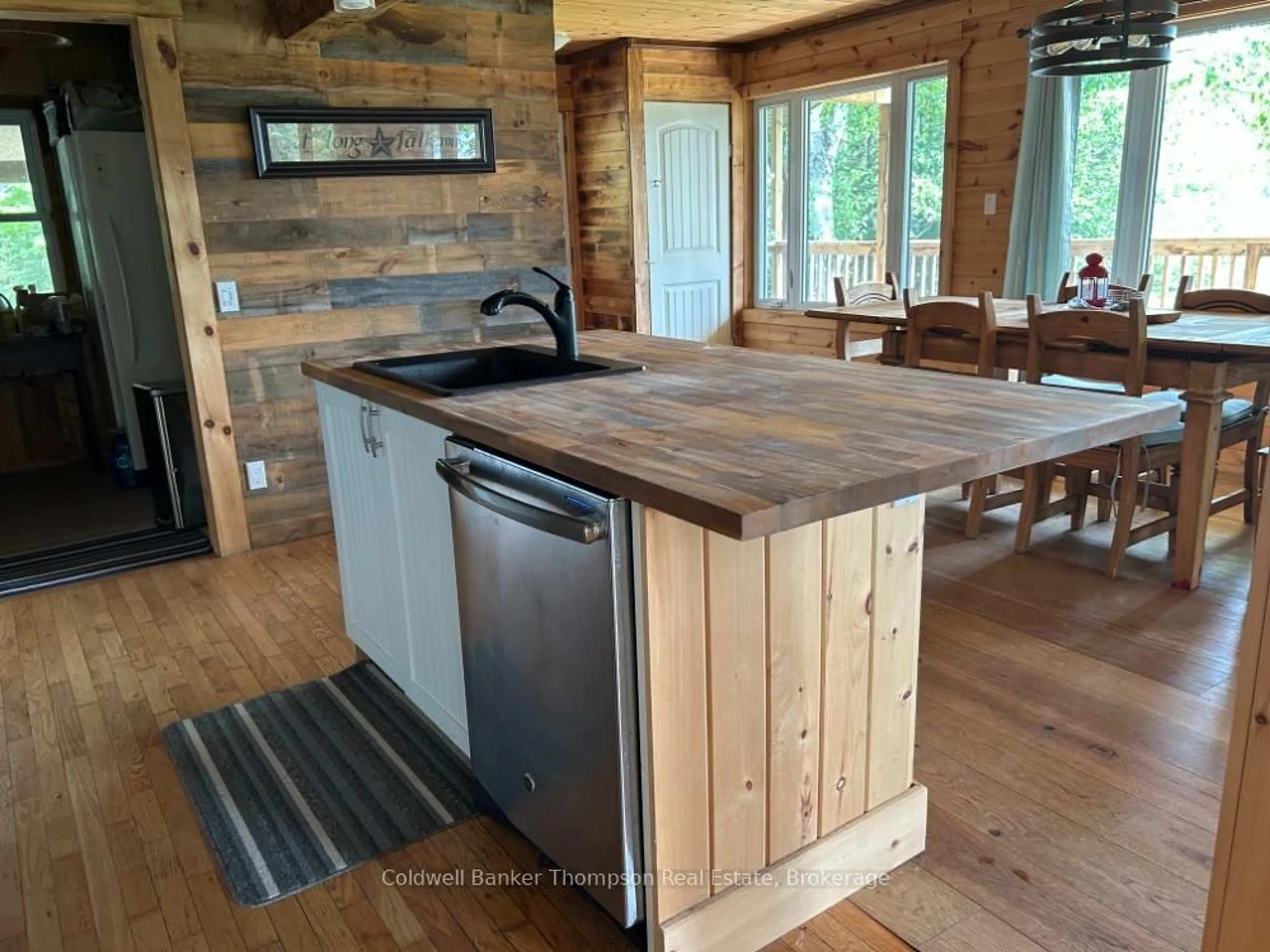 Rustic kitchen, wood/laminate floor for 118 Brennans Rd, Joly Ontario P0A 1X0