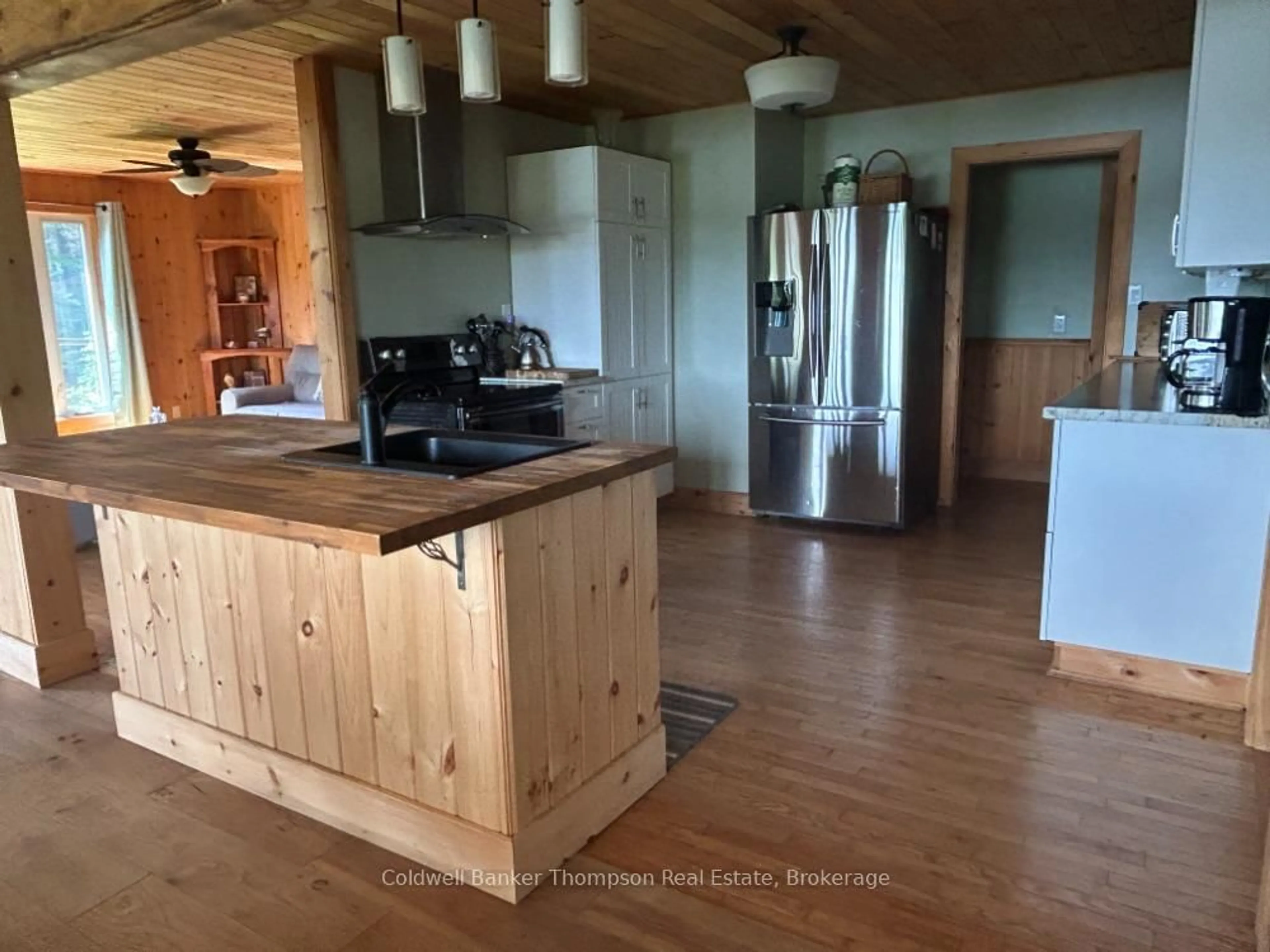 Open concept kitchen, wood/laminate floor for 118 Brennans Rd, Joly Ontario P0A 1X0