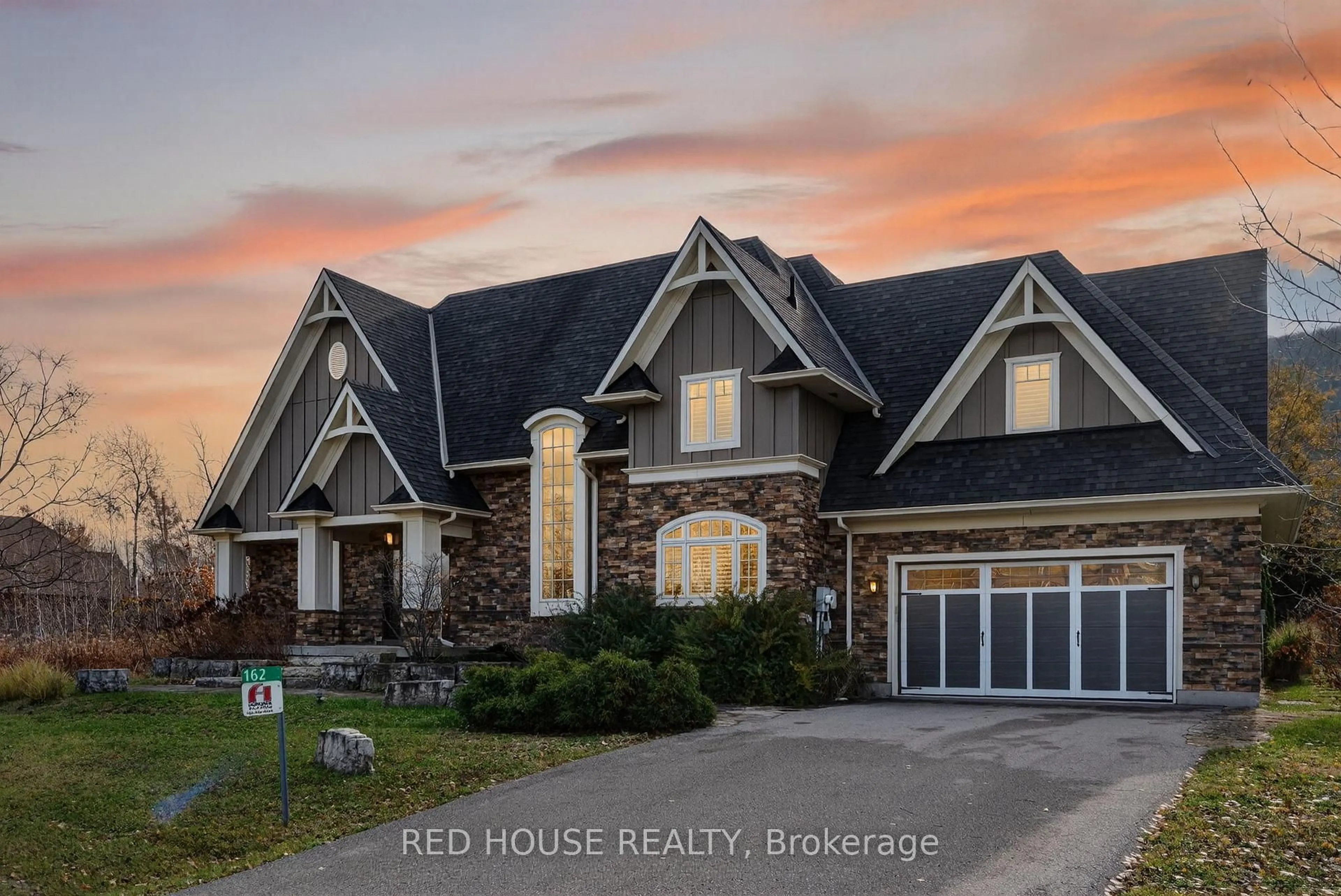 Home with brick exterior material, street for 162 Delphi Lane, Blue Mountains Ontario N0H 1J0
