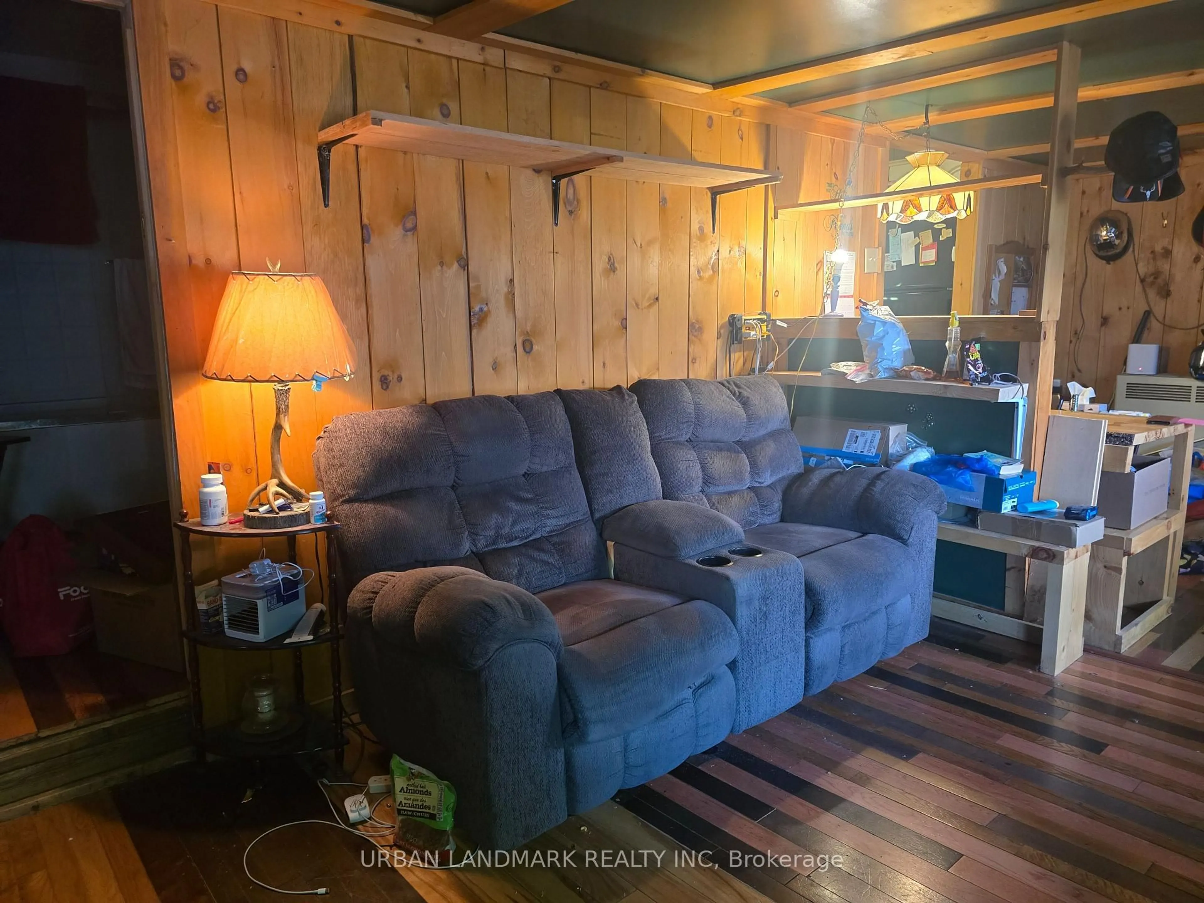 Living room with furniture, wood/laminate floor for 302 Quin Mo Lac Rd #96, Madoc Ontario K0K 2K0