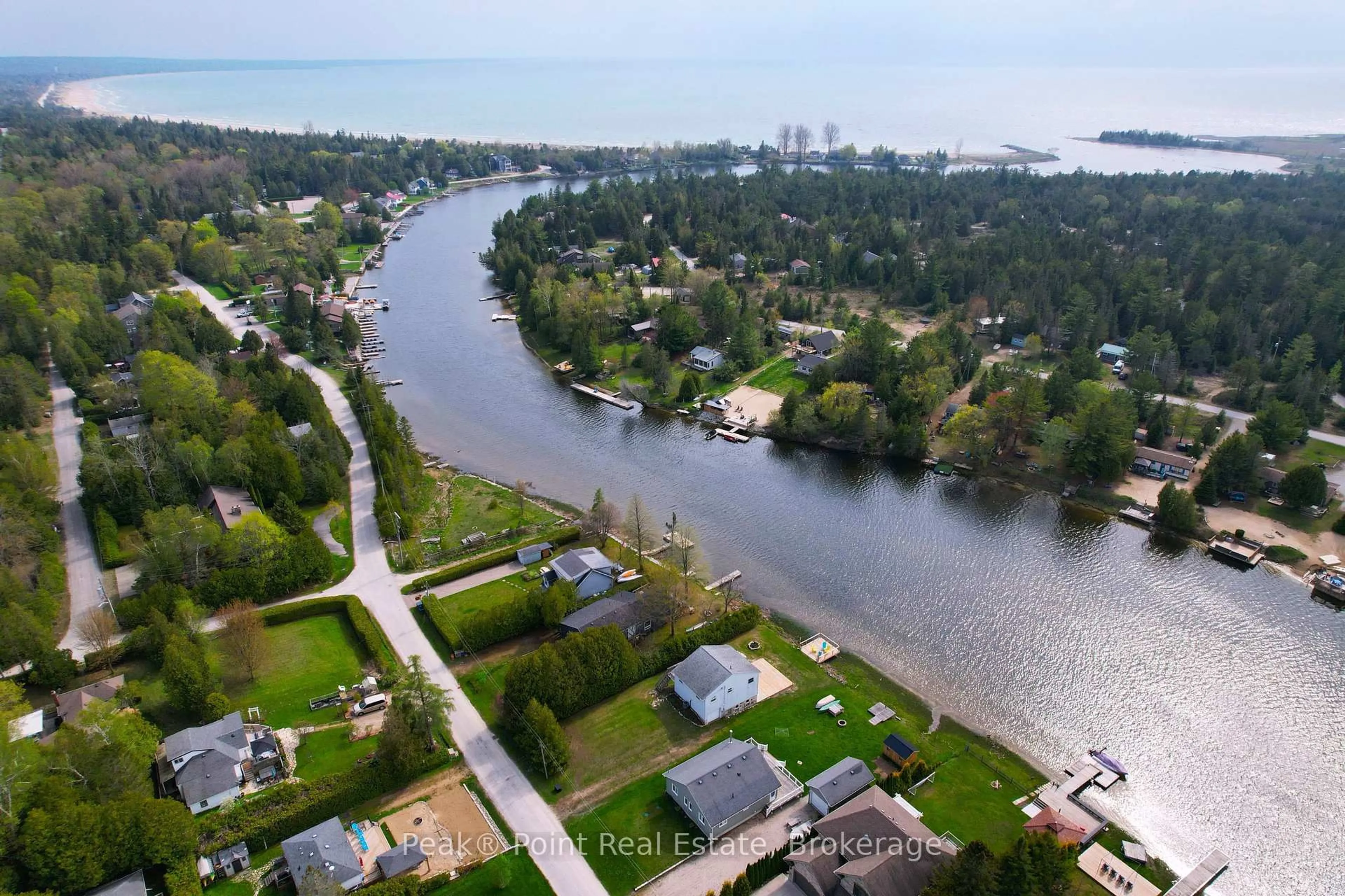 A pic from outside/outdoor area/front of a property/back of a property/a pic from drone, water/lake/river/ocean view for 55 Marina Ave, South Bruce Peninsula Ontario N0H 2G0