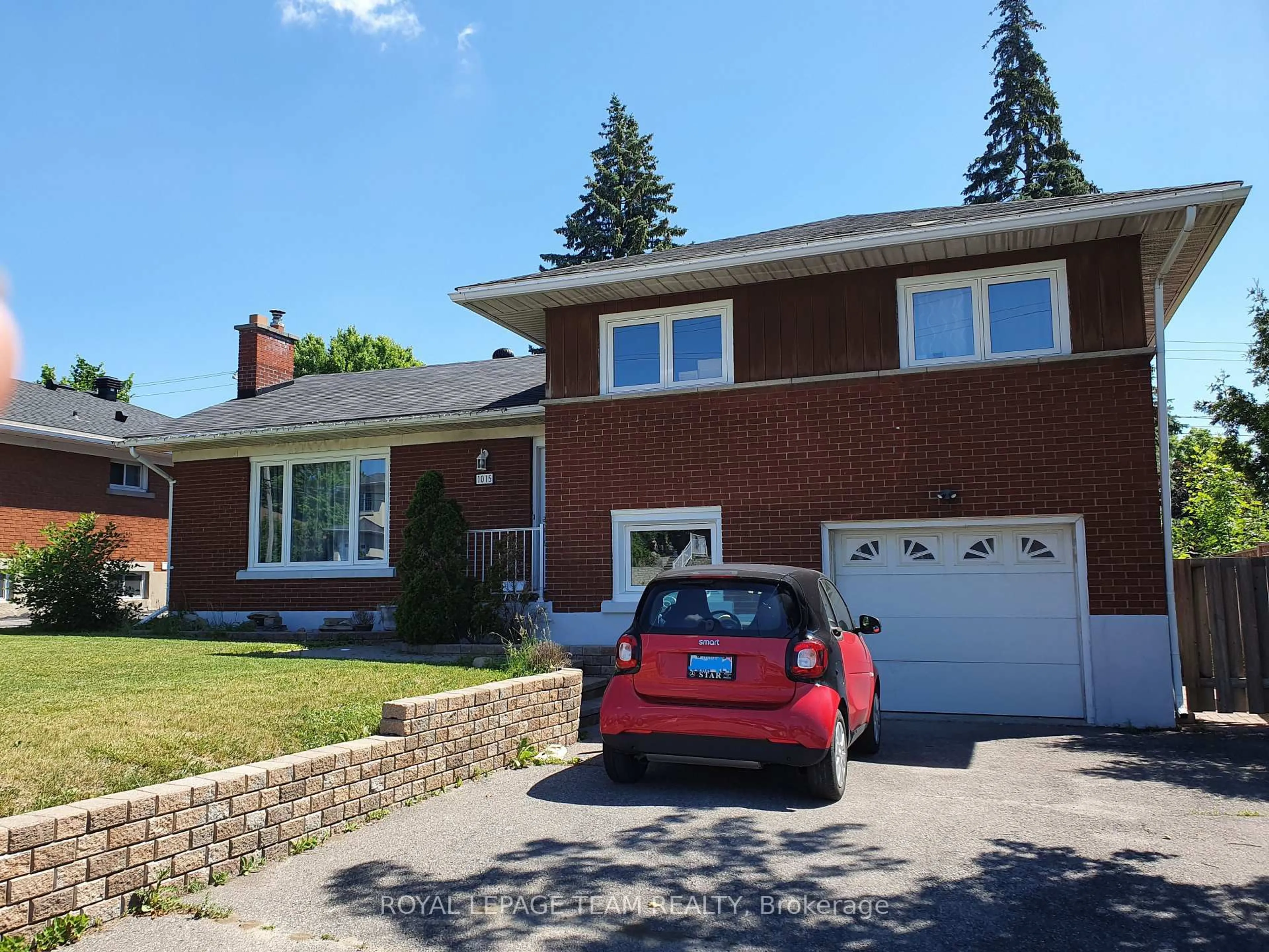 Home with brick exterior material, street for 1015 Pinecrest Rd, Ottawa Ontario K2B 6B6