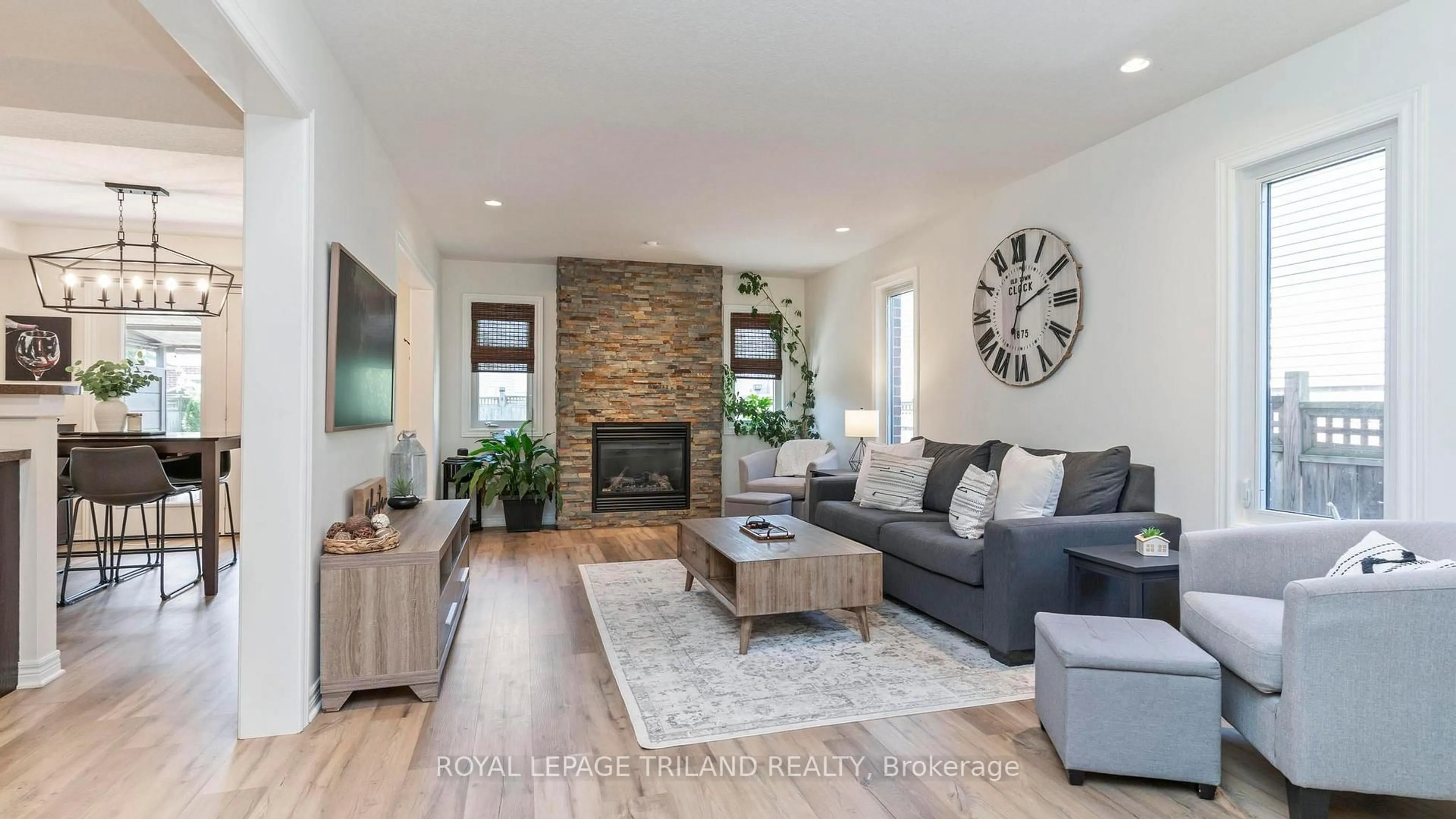 Living room with furniture, wood/laminate floor for 34 PINE VALLEY Dr, St. Thomas Ontario N5P 0A9