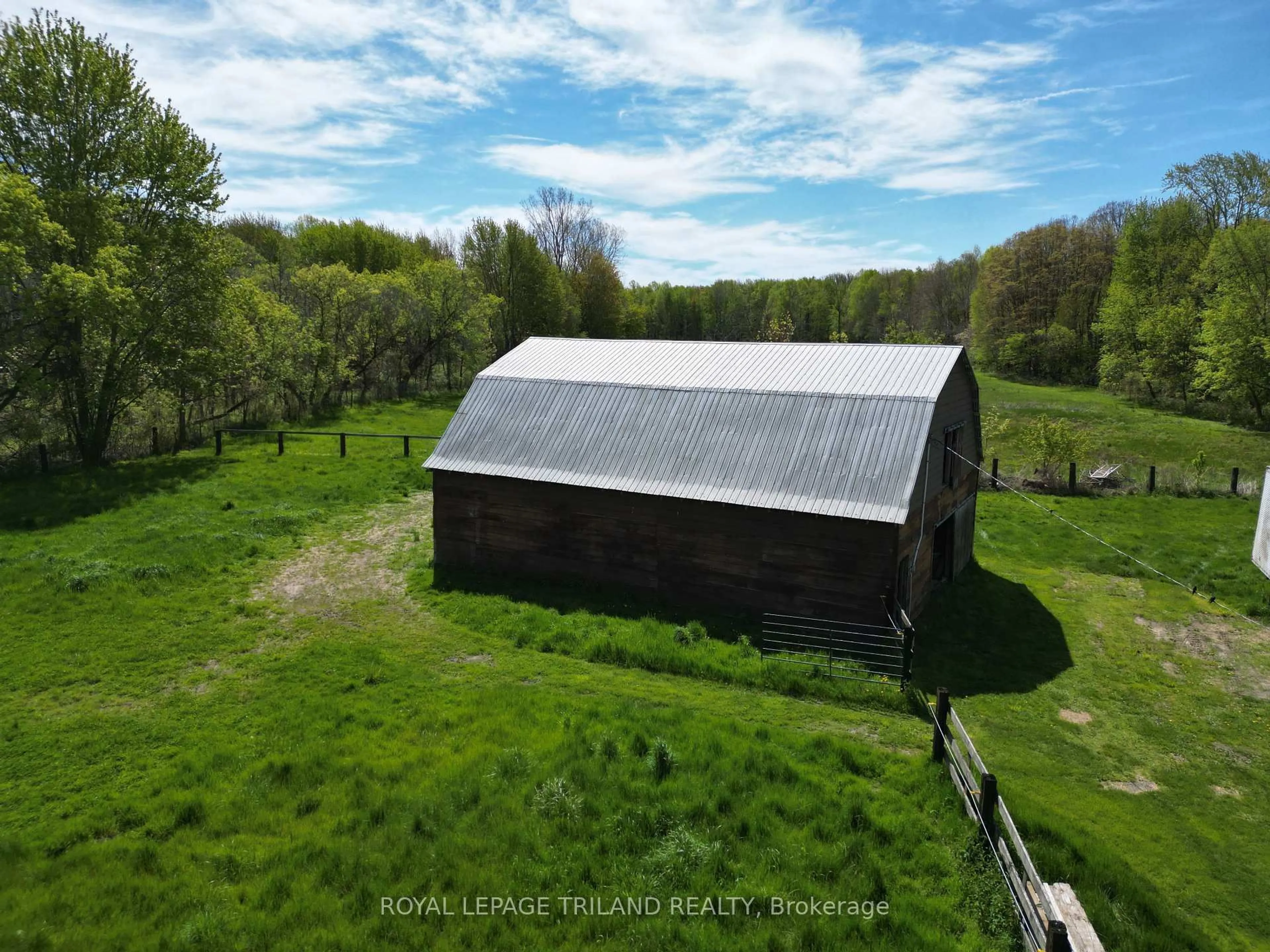 A pic from outside/outdoor area/front of a property/back of a property/a pic from drone, building for 24909 Queens Line, West Elgin Ontario N0L 2P0