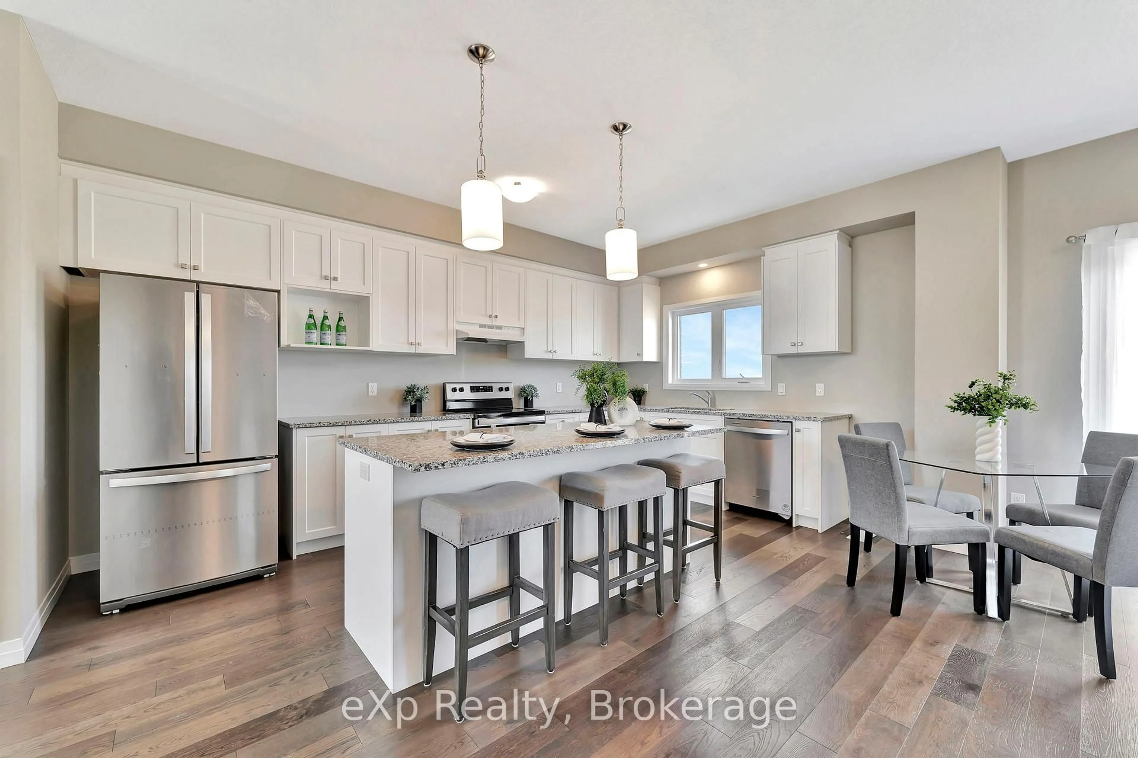 Open concept kitchen, wood/laminate floor for 106 O.J Gaffney Dr, Stratford Ontario N5A 0K9