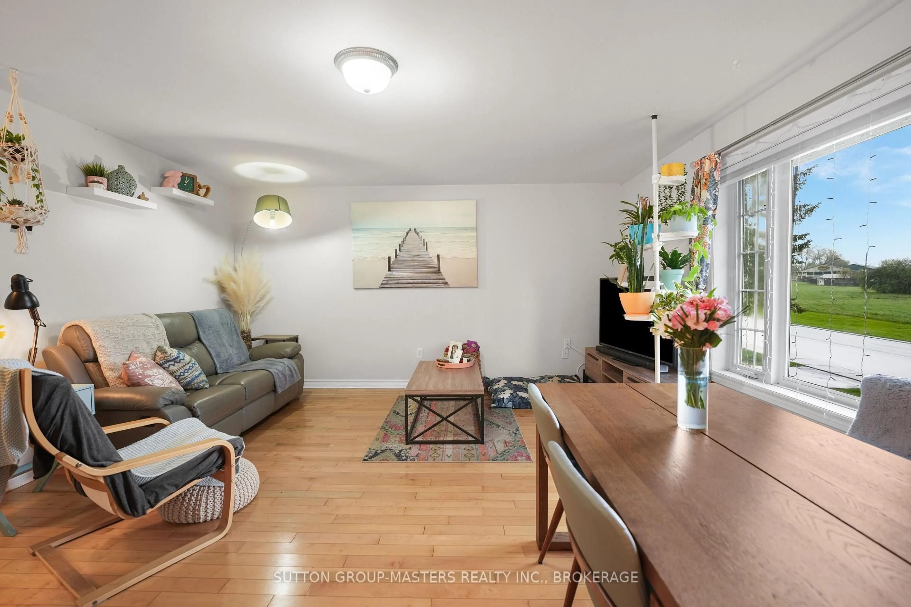 Living room with furniture, wood/laminate floor for 117 First St, Deseronto Ontario K0K 1X0