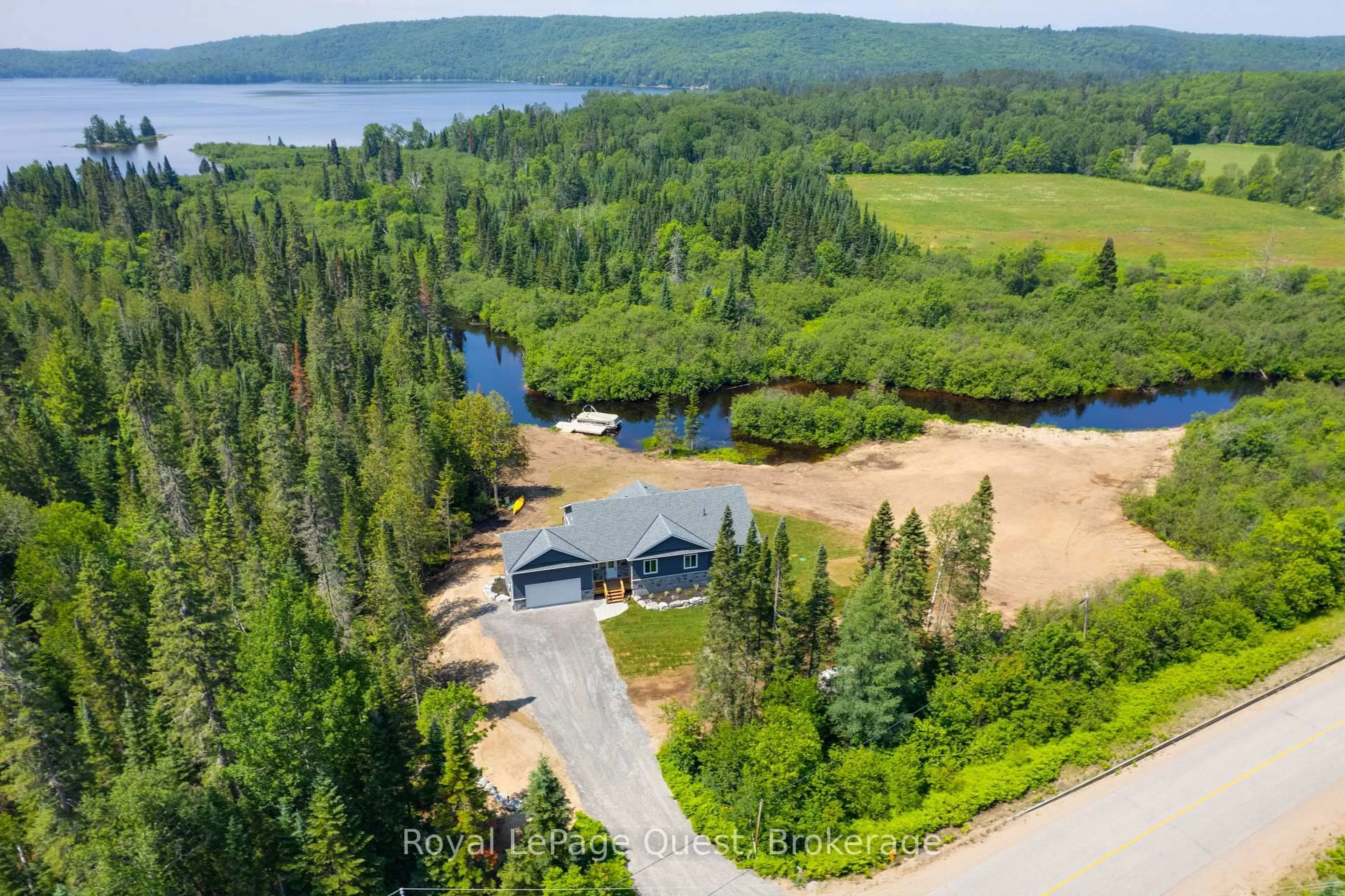 A pic from outside/outdoor area/front of a property/back of a property/a pic from drone, water/lake/river/ocean view for 4400 518 Highway East, Kearney Ontario P0A 1M0