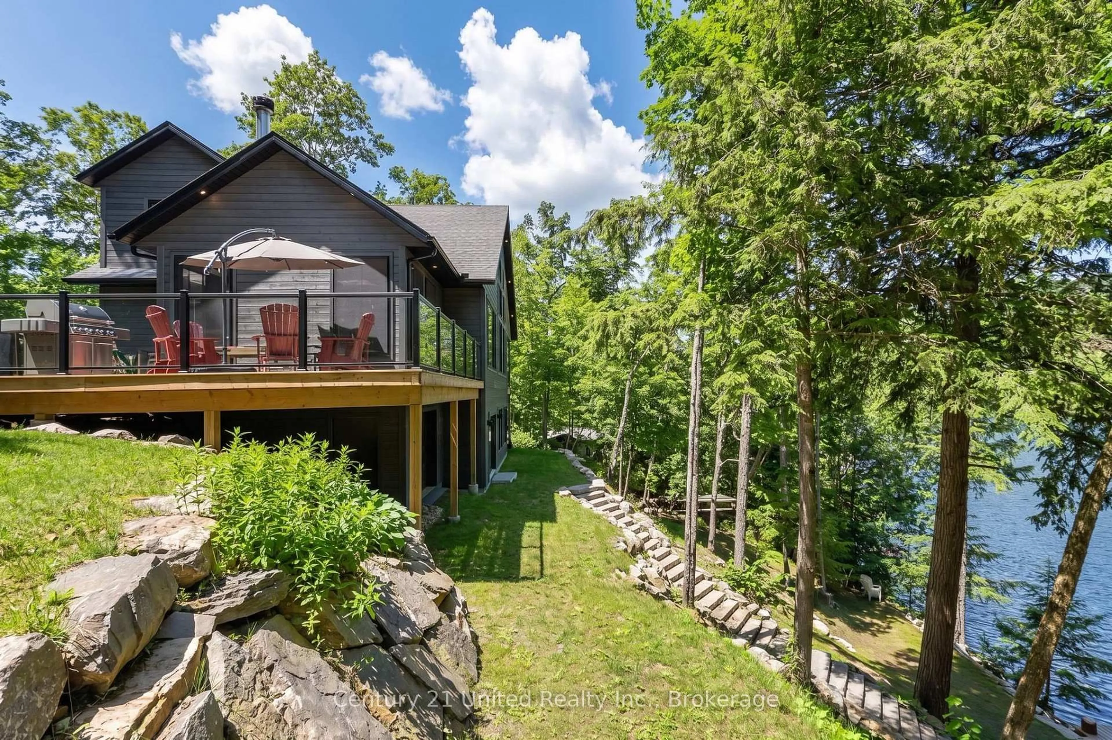 A pic from outside/outdoor area/front of a property/back of a property/a pic from drone, water/lake/river/ocean view for 1106 Lucky Copper Tr, Highlands East Ontario K0M 2A1