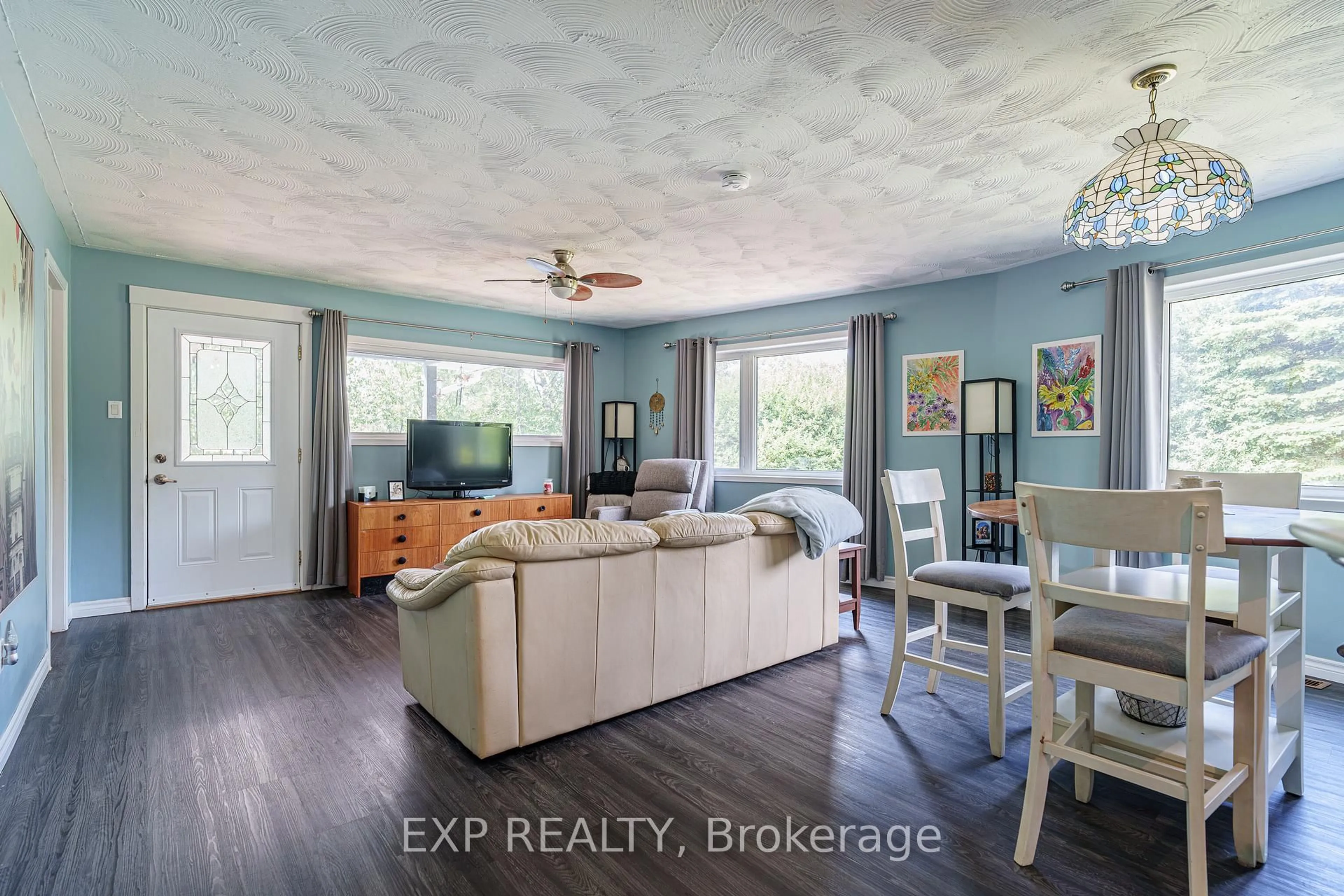 Living room with furniture, wood/laminate floor for 8131 County Road 44 Rd, Edwardsburgh/Cardinal Ontario K0E 1X0