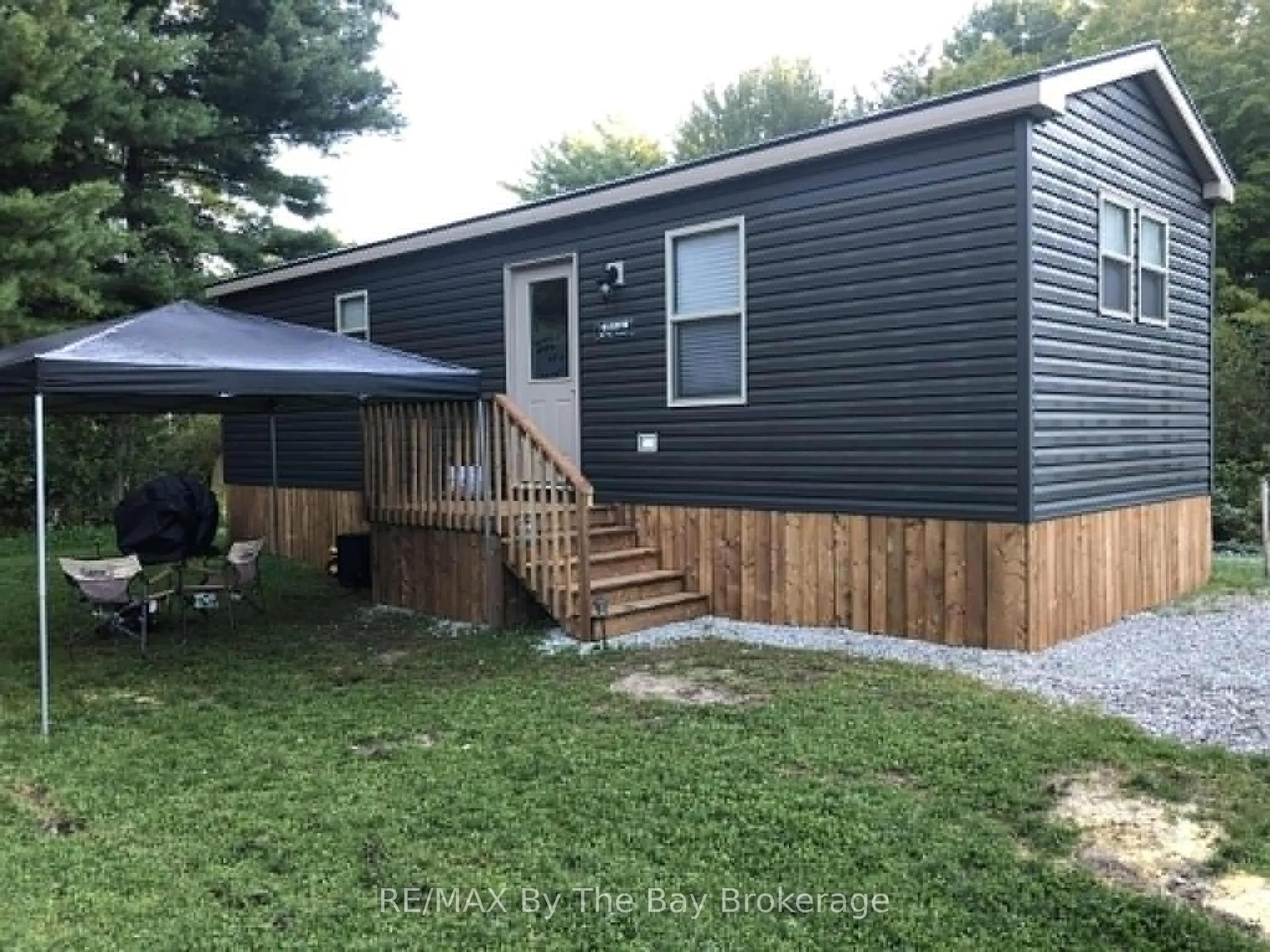 Home with vinyl exterior material, street for 1082 Shamrock Marina Rd #210, Gravenhurst Ontario P0E 1N0