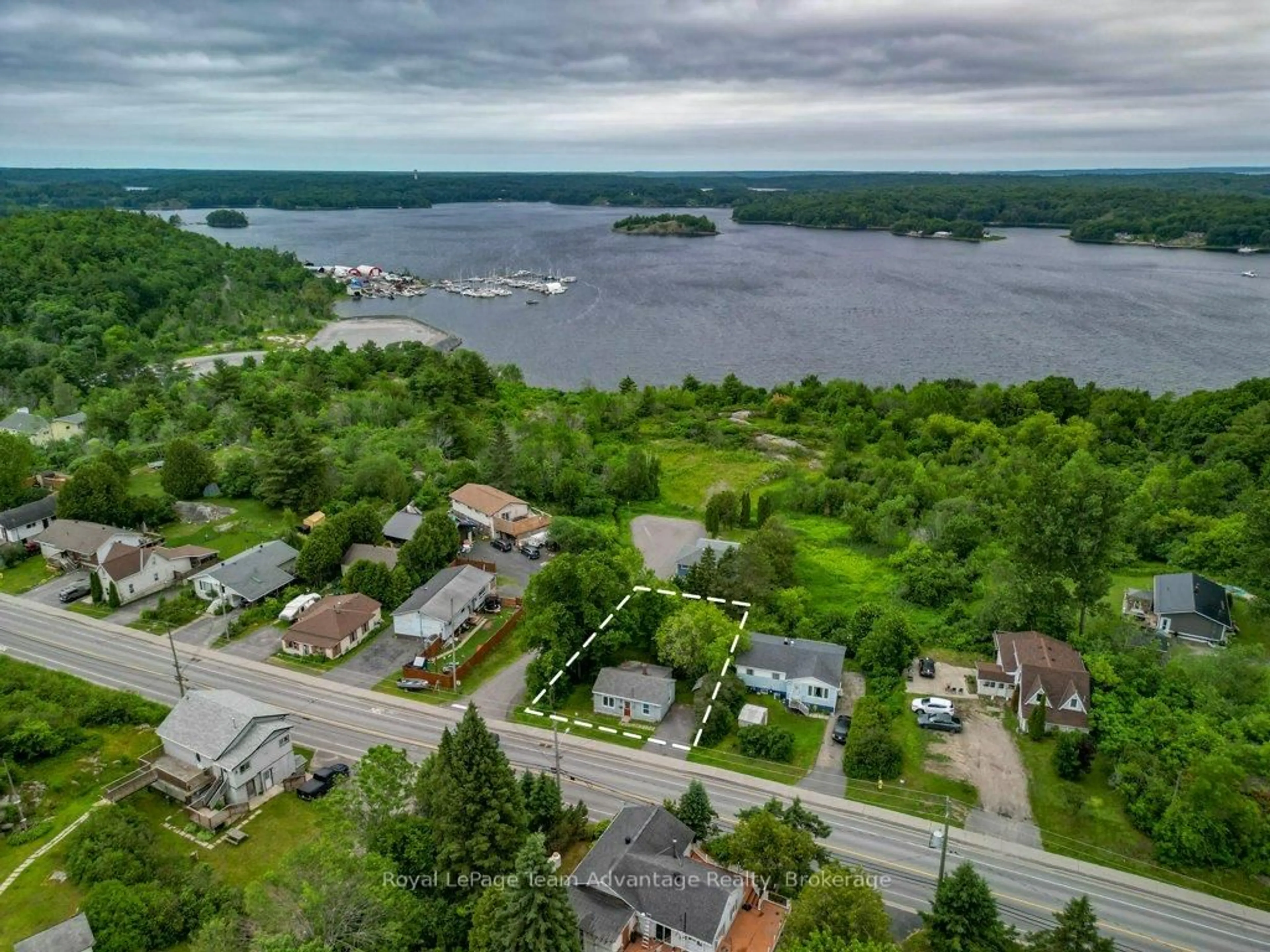 A pic from outside/outdoor area/front of a property/back of a property/a pic from drone, water/lake/river/ocean view for 41 Emily St, Parry Sound Ontario P2A 2P6