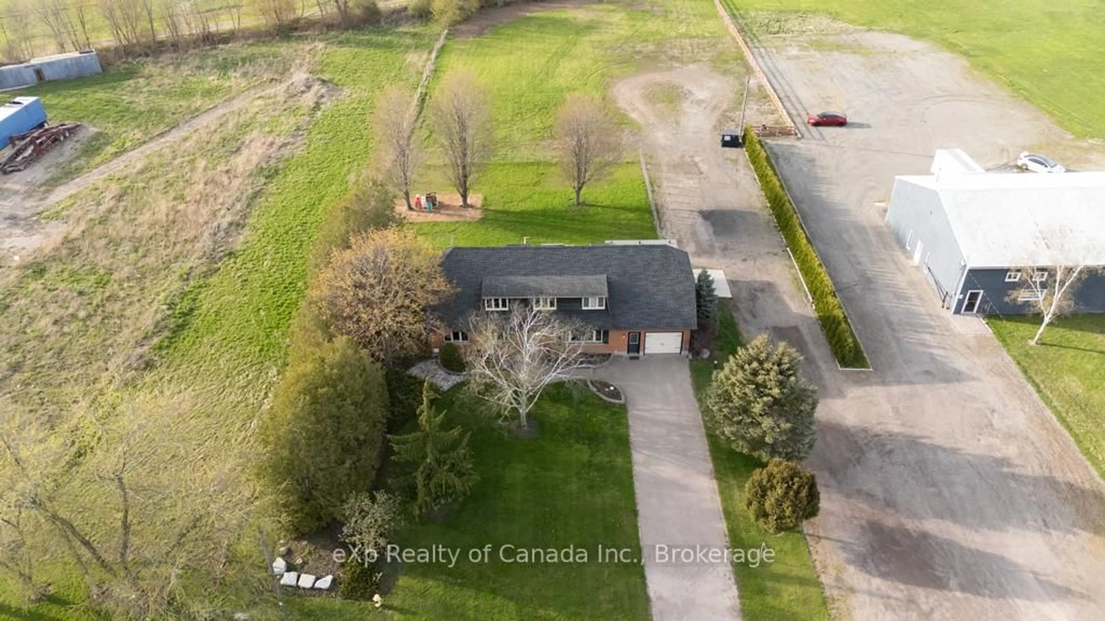 A pic from outside/outdoor area/front of a property/back of a property/a pic from drone, street for 285687 Airport Rd, Norwich Ontario N0J 1P0