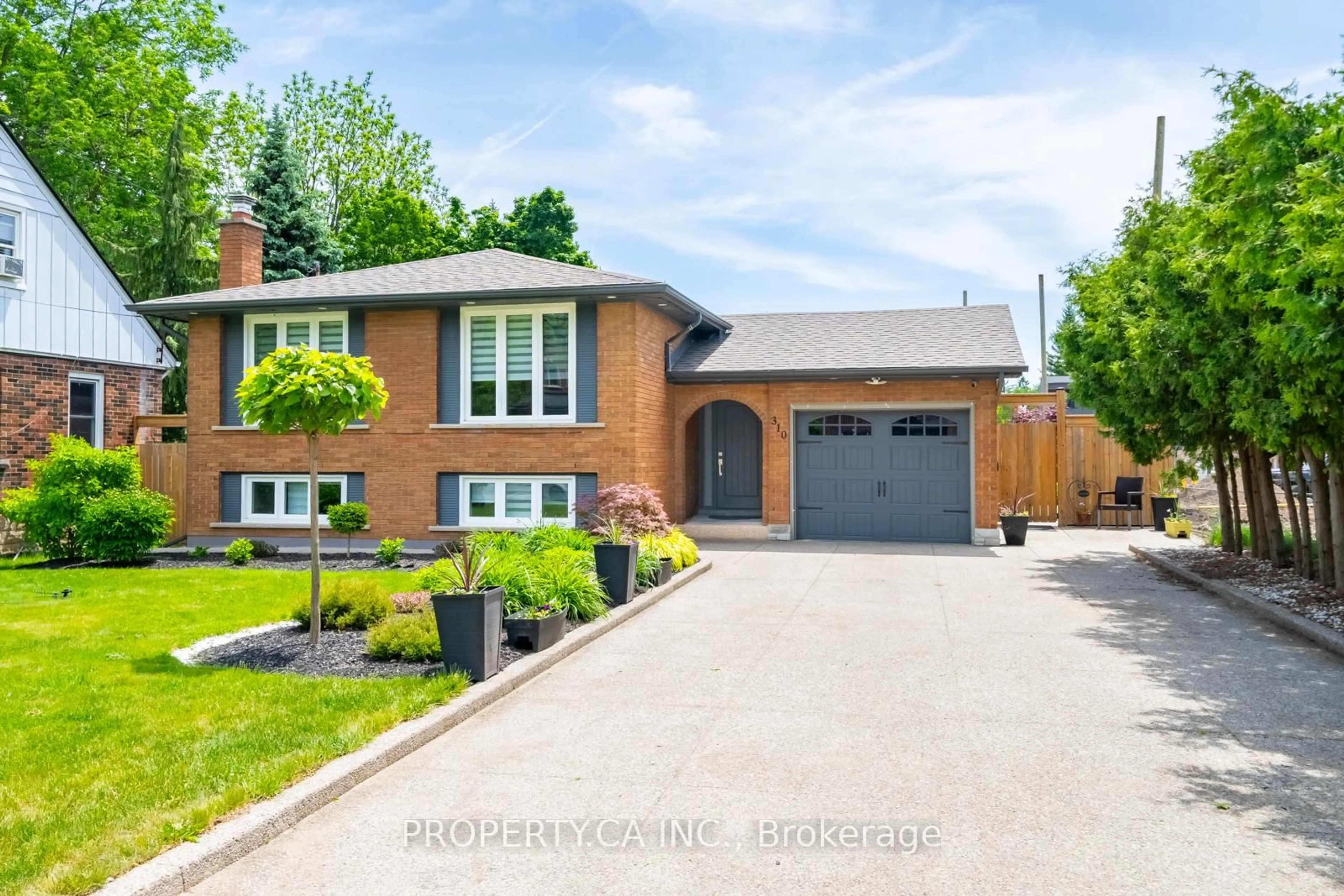 Home with brick exterior material, street for 310 Parkside Dr, Hamilton Ontario L0R 2H5