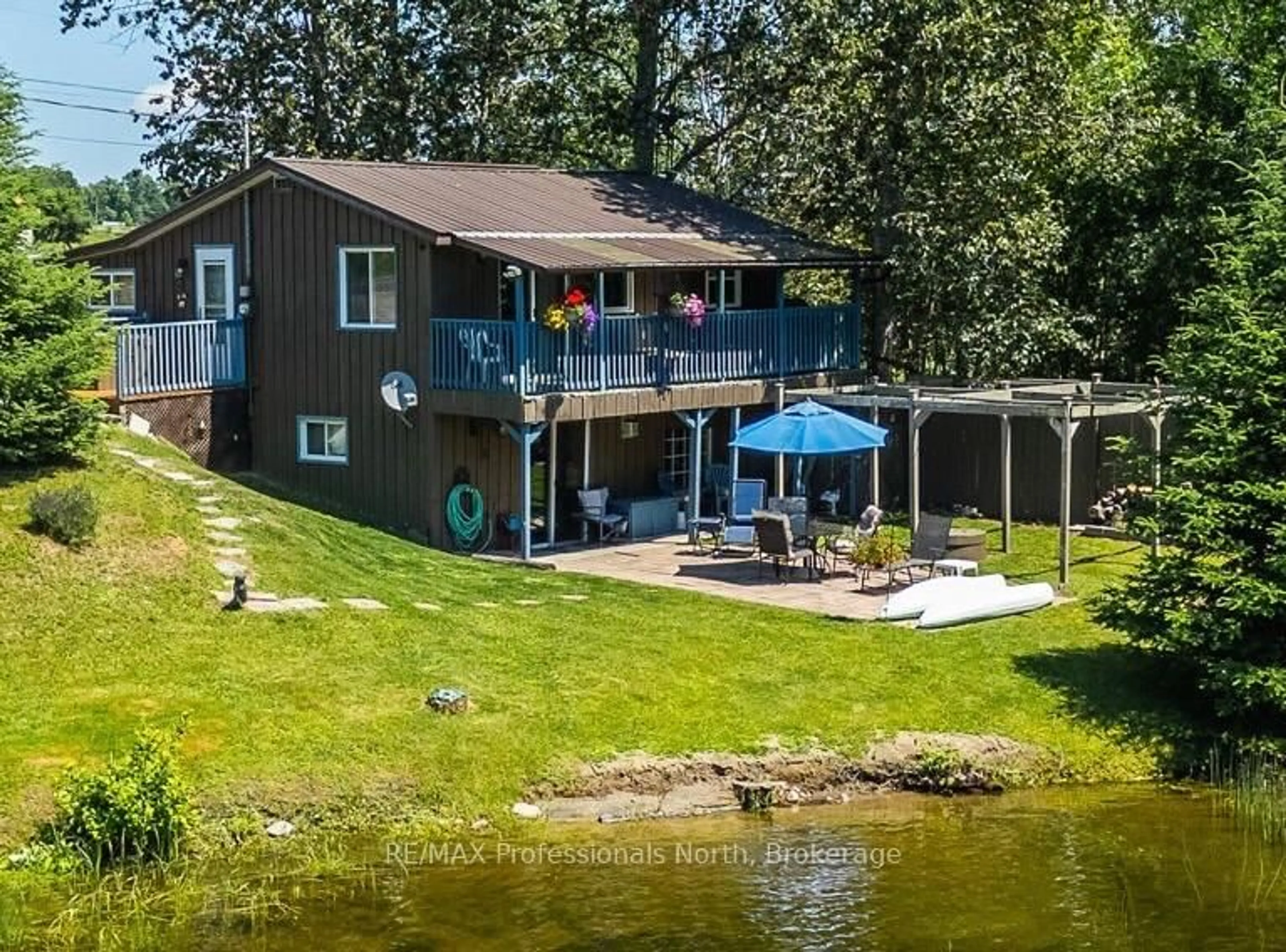 A pic from outside/outdoor area/front of a property/back of a property/a pic from drone, water/lake/river/ocean view for 4278 Deep Bay Rd, Minden Hills Ontario K0M 2K0