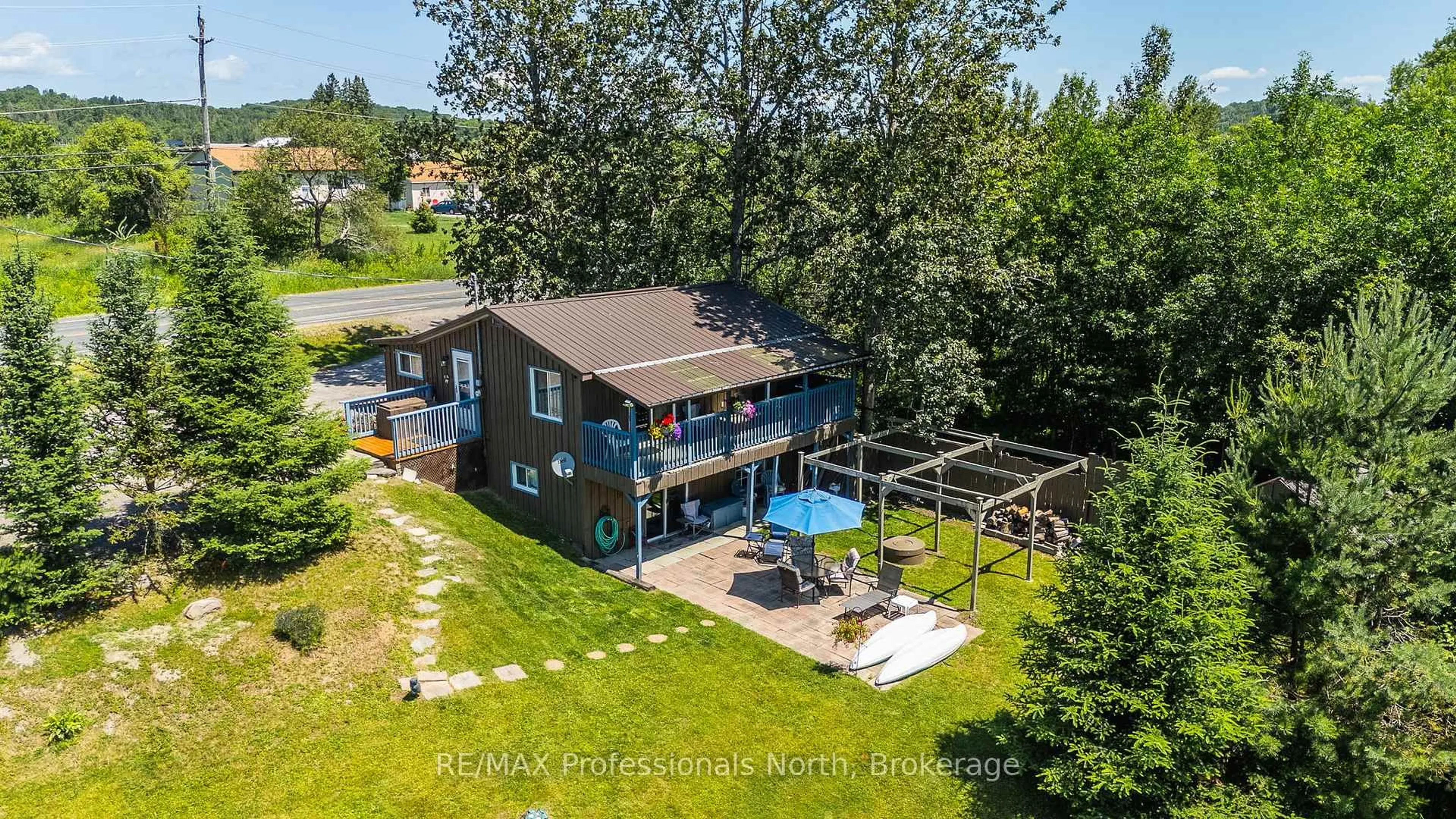 A pic from outside/outdoor area/front of a property/back of a property/a pic from drone, water/lake/river/ocean view for 4278 Deep Bay Rd, Minden Hills Ontario K0M 2K0