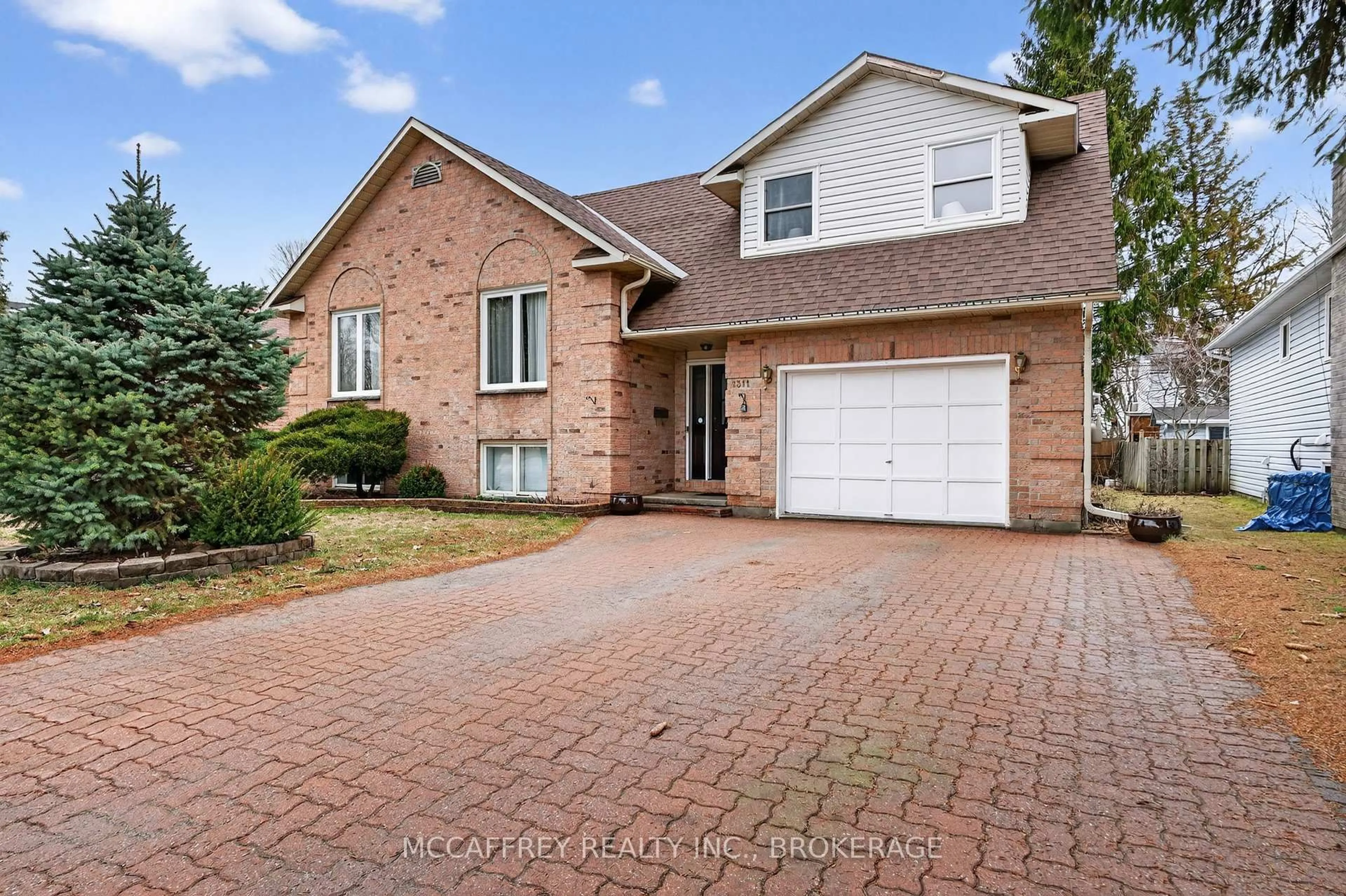 Home with brick exterior material, street for 1311 CUTHBERTSON Ave, Brockville Ontario K6V 6Y2