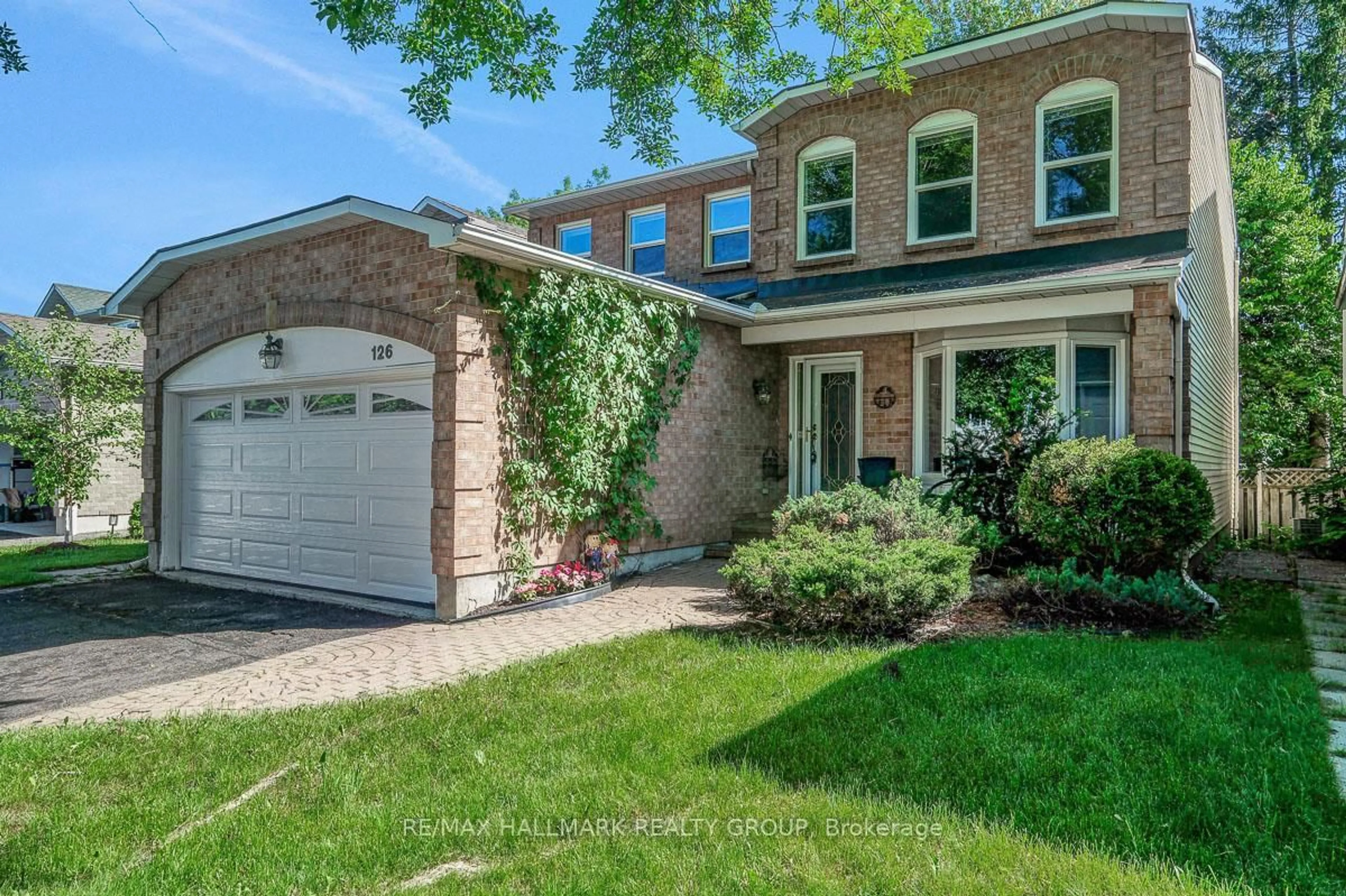 Home with brick exterior material, street for 126 Dossetter Way, Ottawa Ontario K1G 4S5