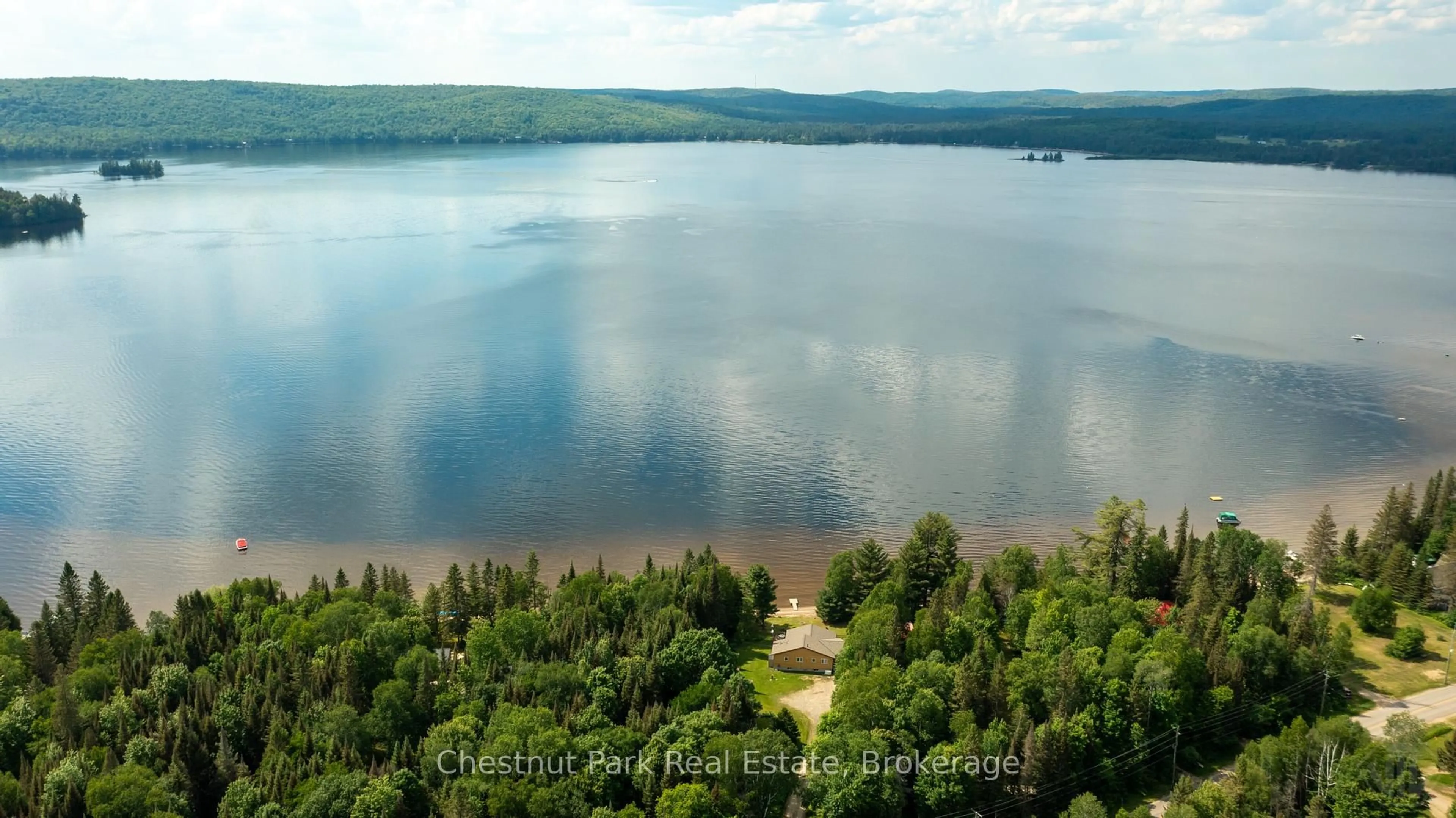 A pic from outside/outdoor area/front of a property/back of a property/a pic from drone, water/lake/river/ocean view for 3702 518 Highway, Kearney Ontario P0A 1M0