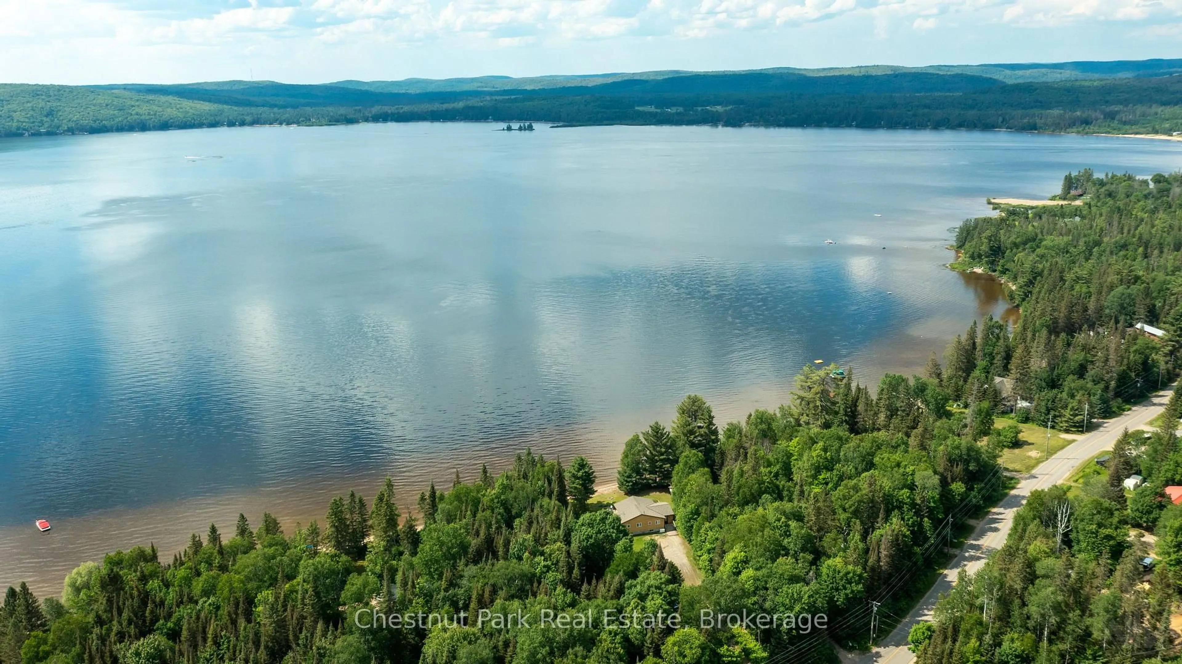 A pic from outside/outdoor area/front of a property/back of a property/a pic from drone, water/lake/river/ocean view for 3702 518 Highway, Kearney Ontario P0A 1M0