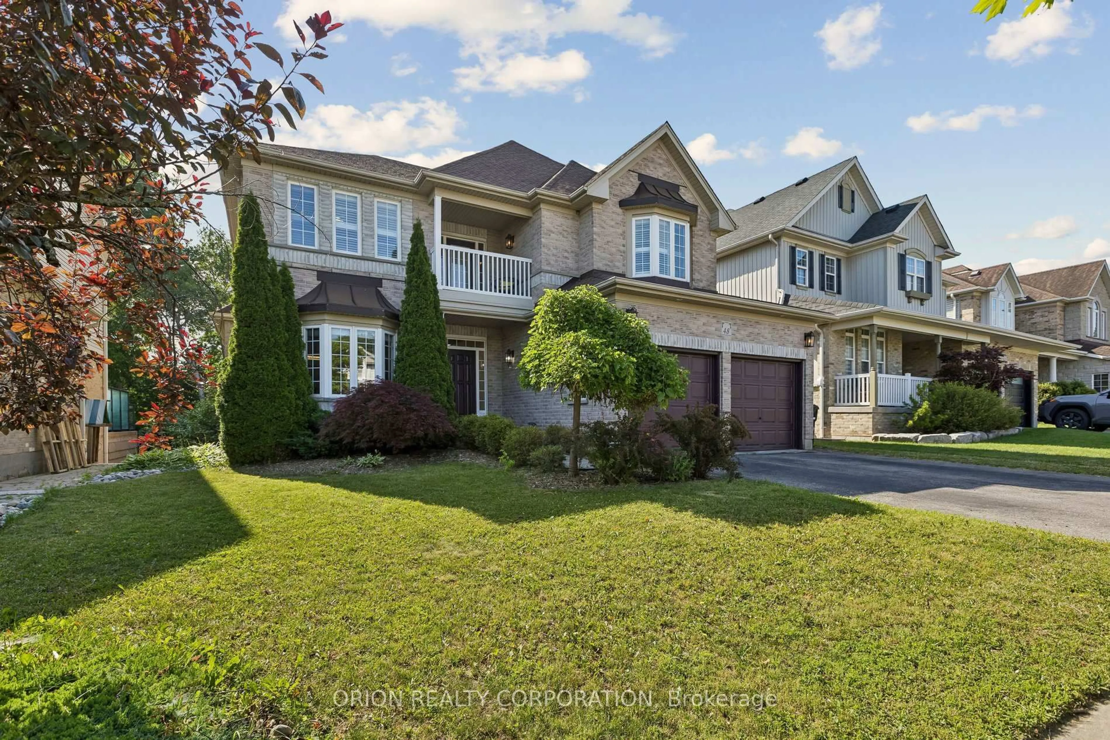 Home with vinyl exterior material, street for 48 Apple Ridge Dr, Kitchener Ontario N2P 2S2