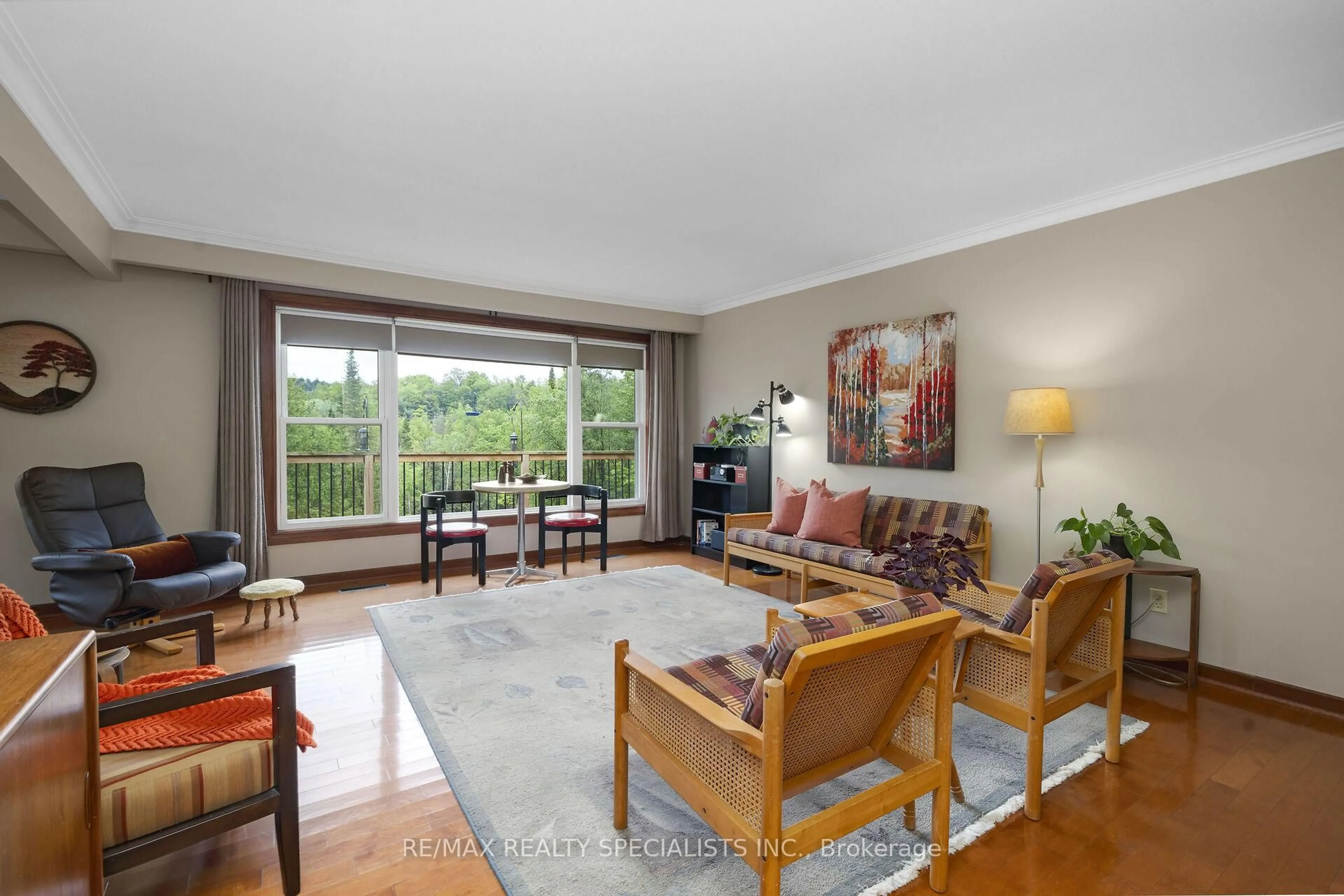 Living room with furniture, wood/laminate floor for 913040 7TH LINE EHS Line, Mono Ontario L9W 6J9