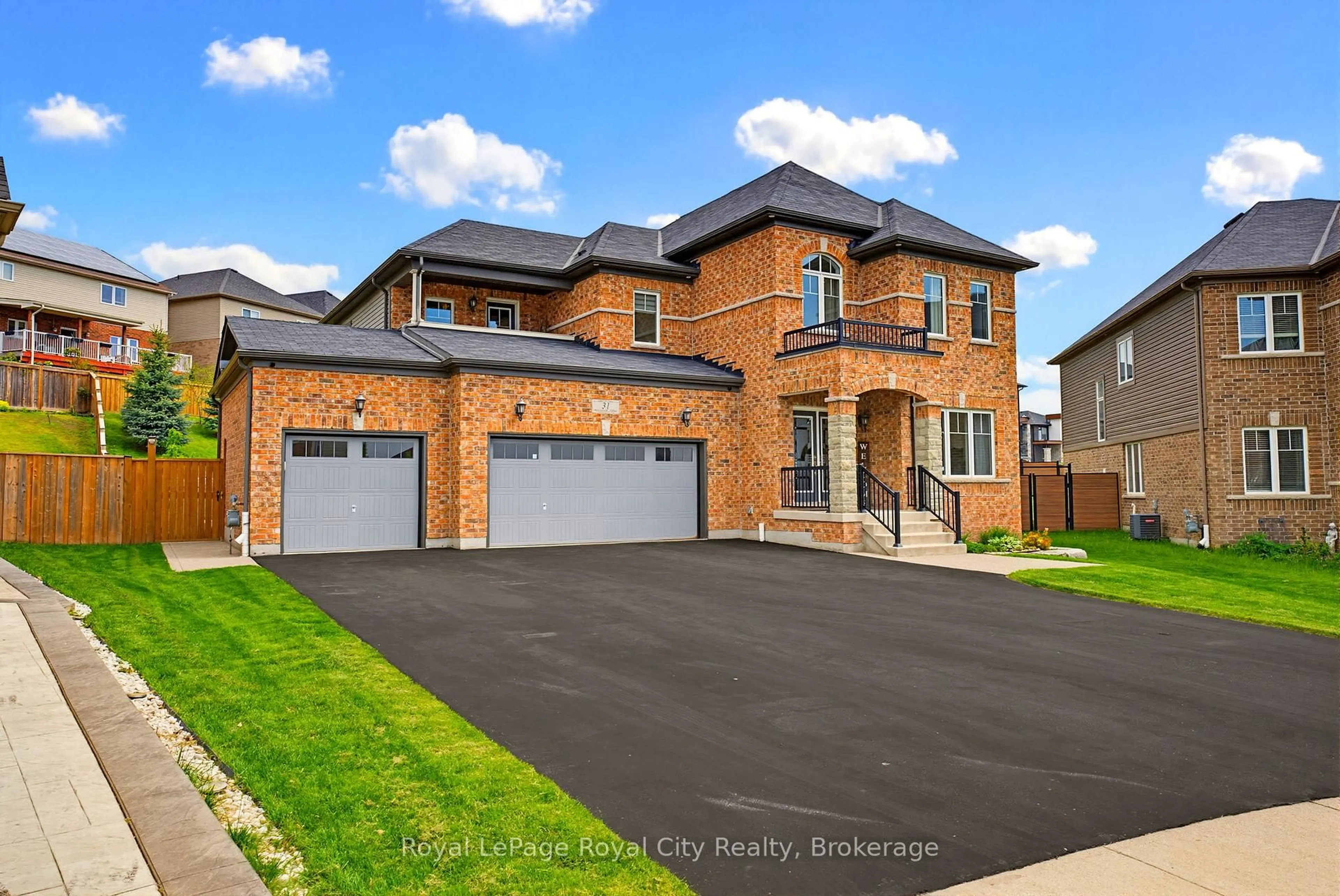 Home with brick exterior material, street for 31 Wetland Way, Kitchener Ontario N2P 2Y8