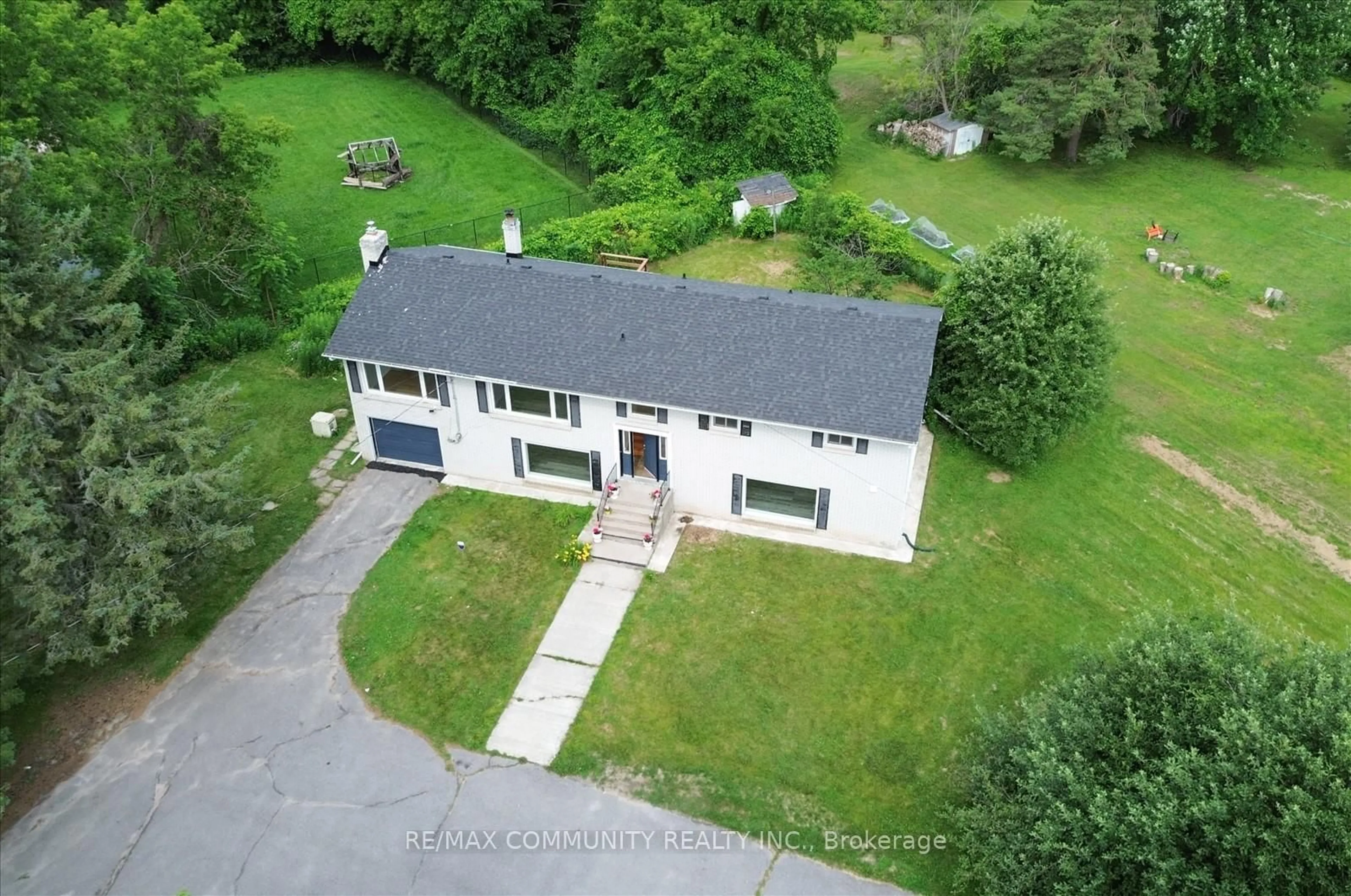 A pic from outside/outdoor area/front of a property/back of a property/a pic from drone, unknown for 719 Old Highway 2, Quinte West Ontario K8V 5P5