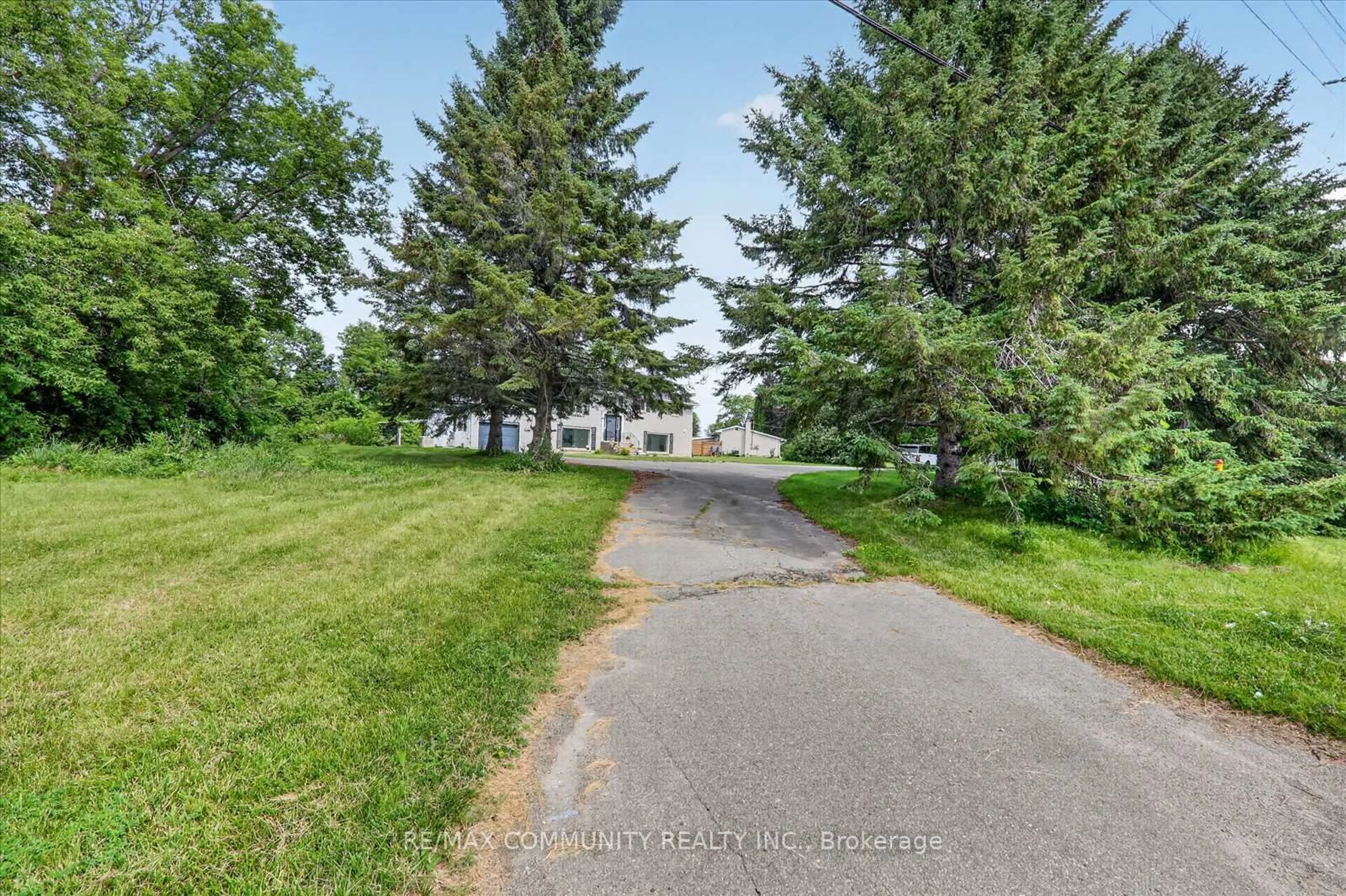 A pic from outside/outdoor area/front of a property/back of a property/a pic from drone, street for 719 Old Highway 2, Quinte West Ontario K8V 5P5