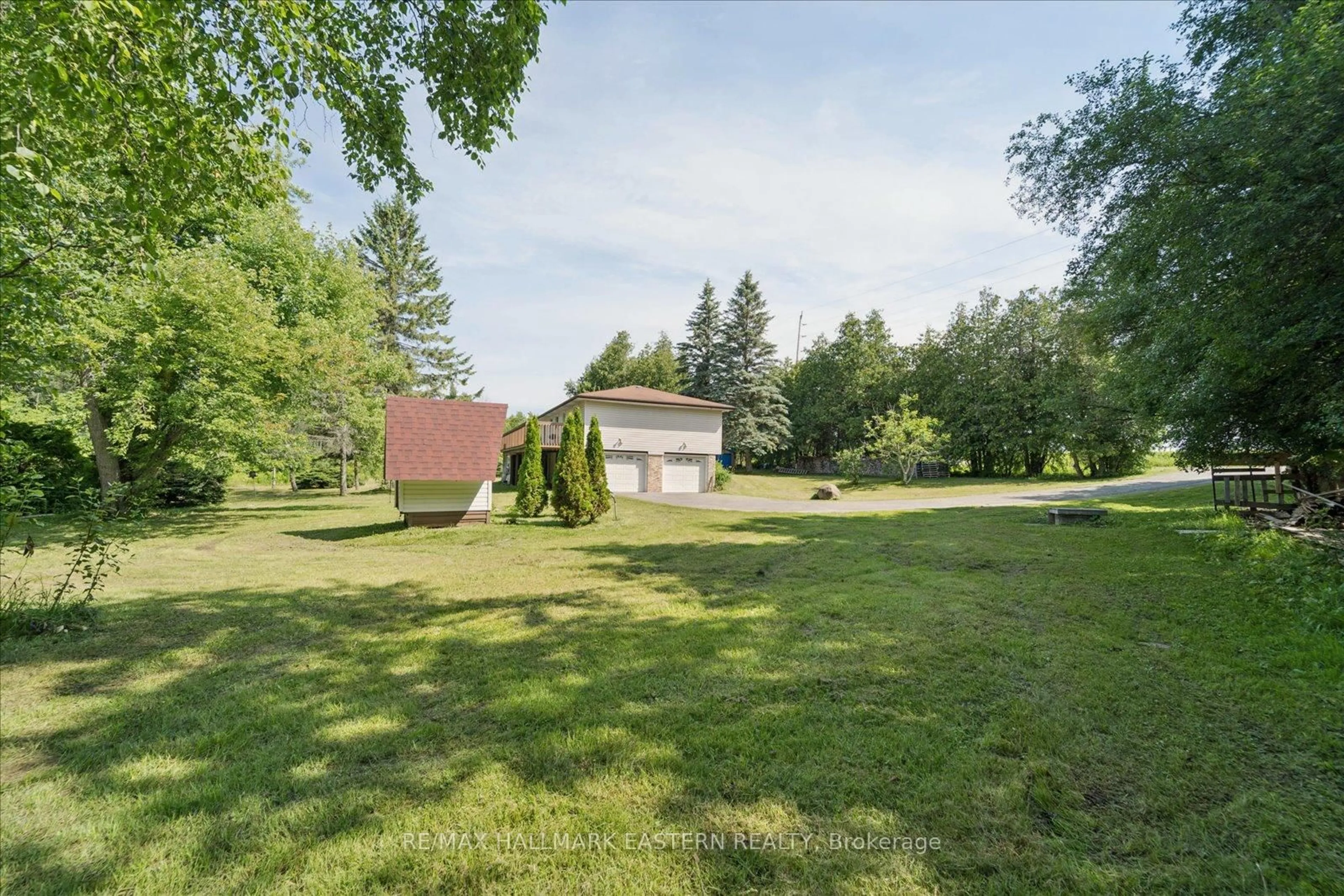 A pic from outside/outdoor area/front of a property/back of a property/a pic from drone, forest/trees view for 401 Ogemah Rd, Kawartha Lakes Ontario K0M 2C0