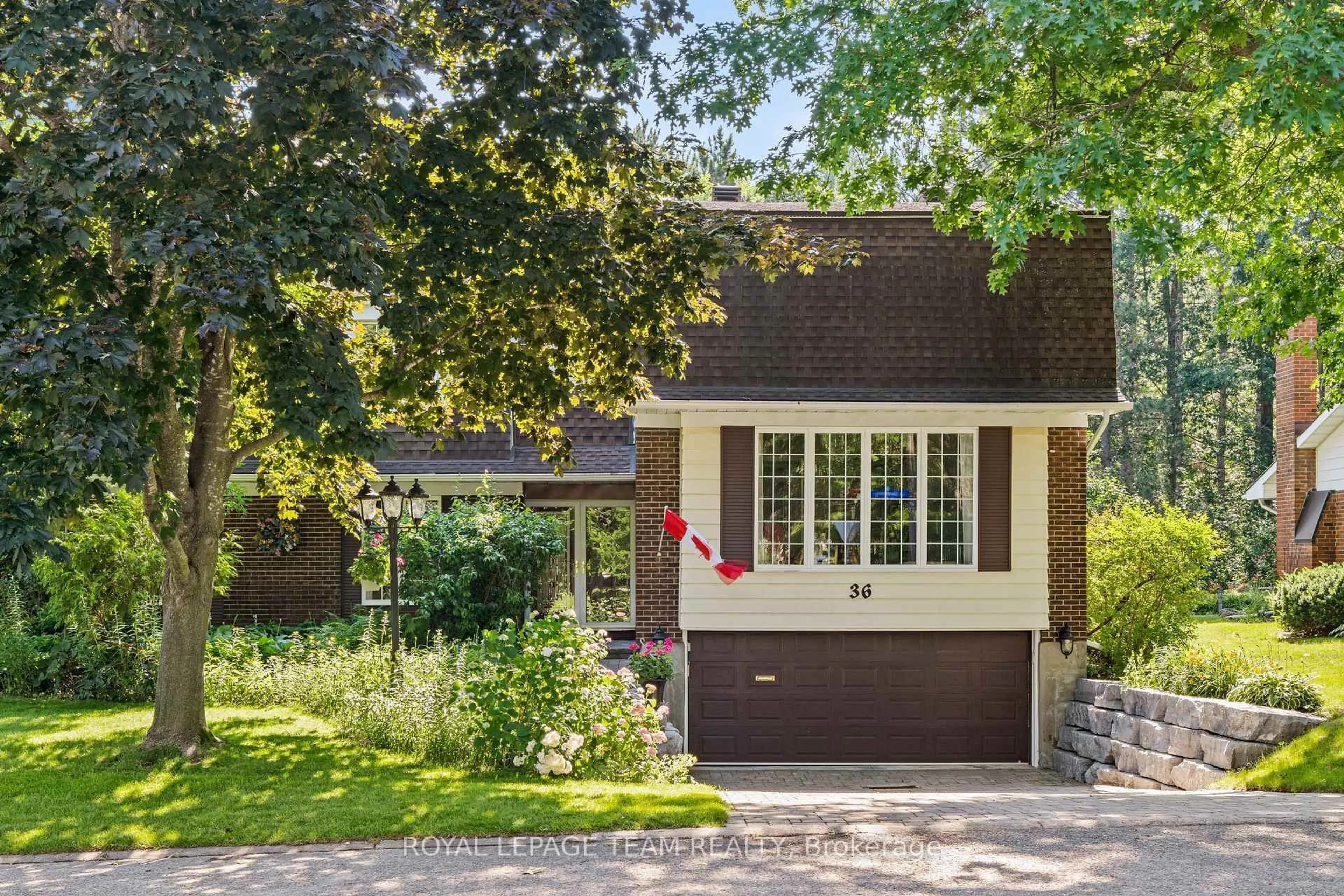 Home with brick exterior material, street for 36 Glendenning Dr, Ottawa Ontario K2H 7Y9