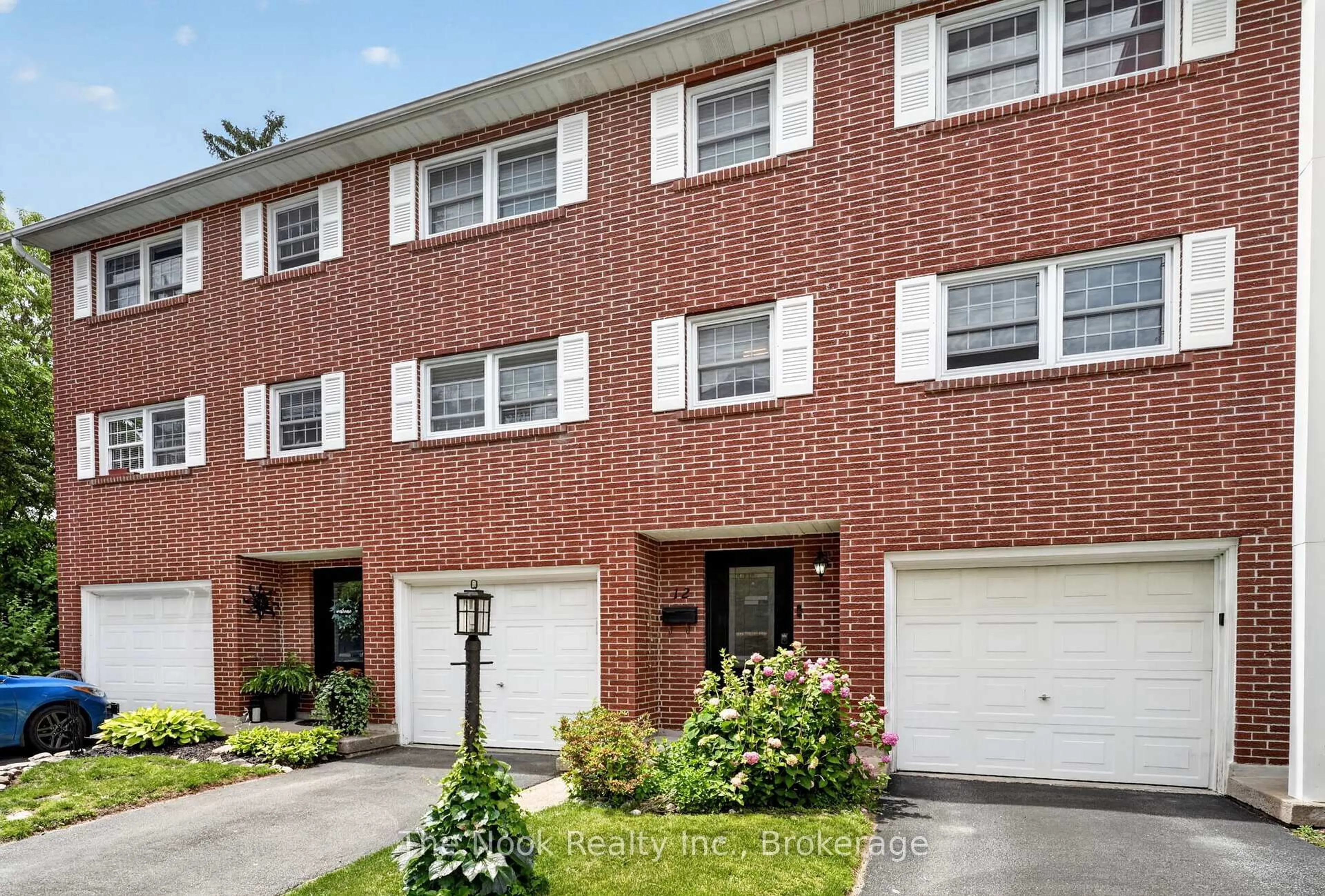 Home with brick exterior material, street for 91 LIVINGSTON Ave #12, Grimsby Ontario L3M 1L4