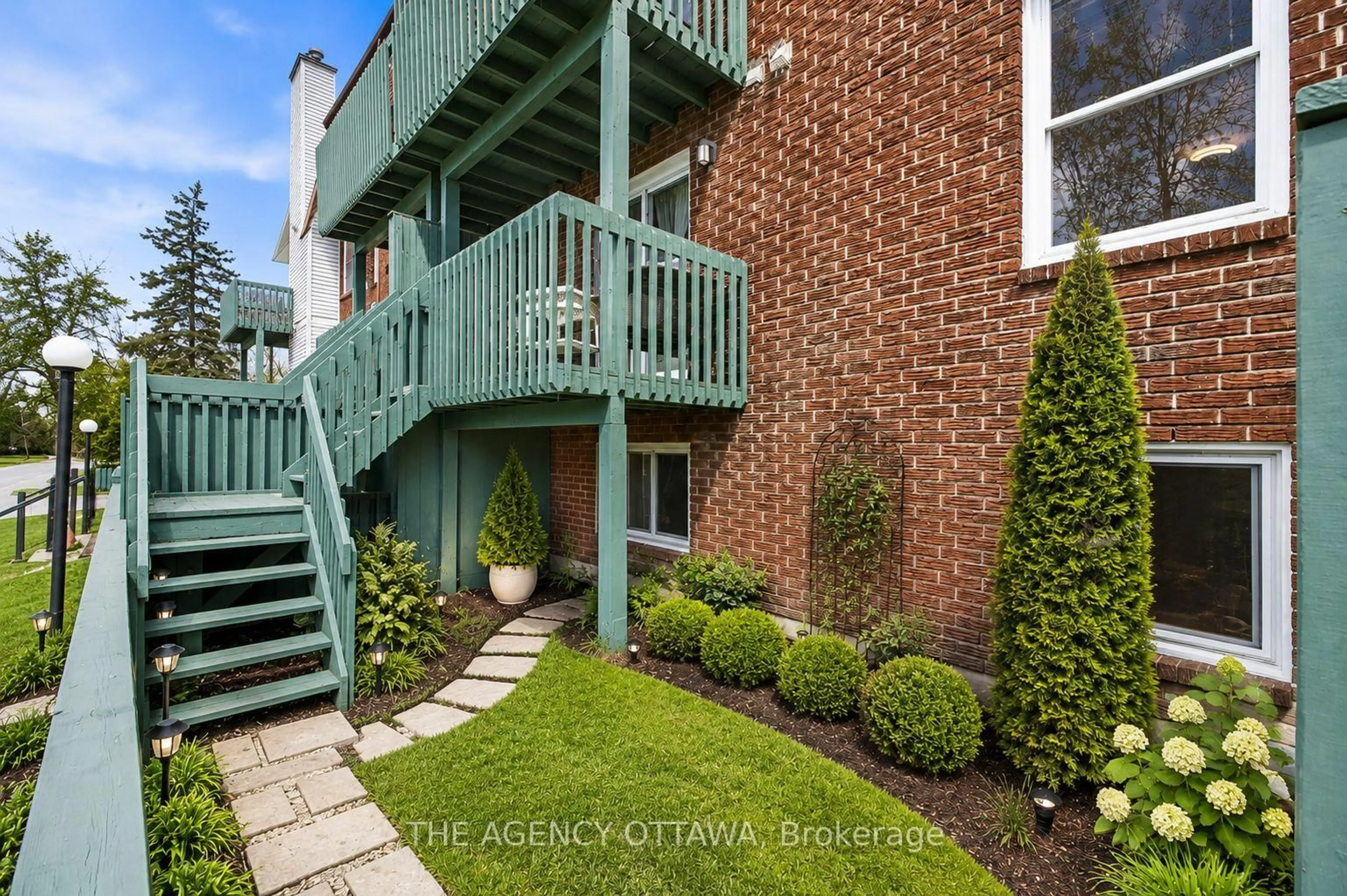 A pic from outside/outdoor area/front of a property/back of a property/a pic from drone, street for 299 Thomas St #103, Carleton Place Ontario K7C 4B8