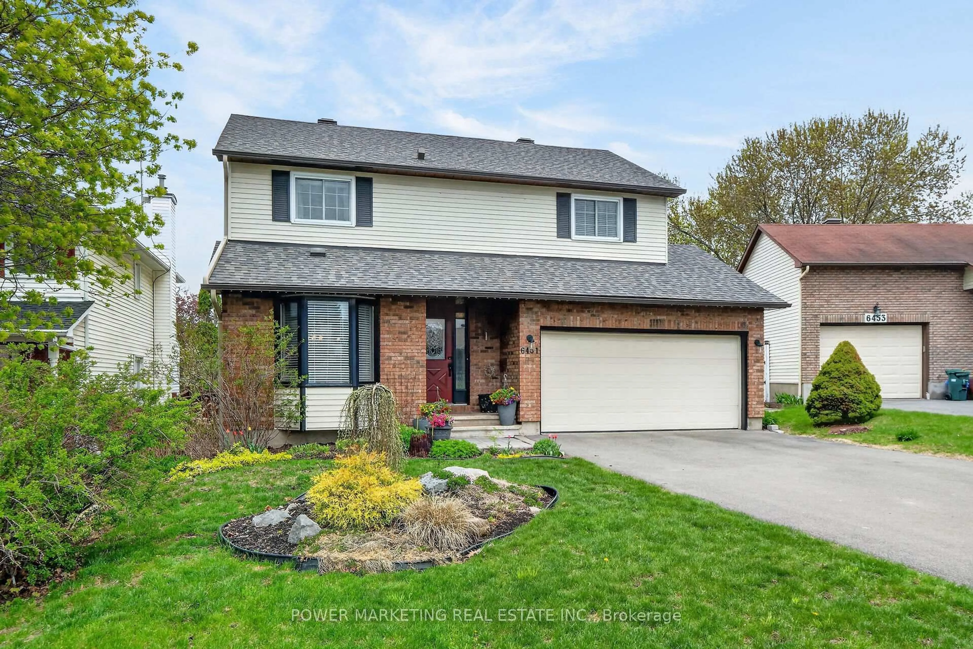 Home with brick exterior material, street for 6451 VISENEAU Dr, Orleans Ontario K1C 5H1
