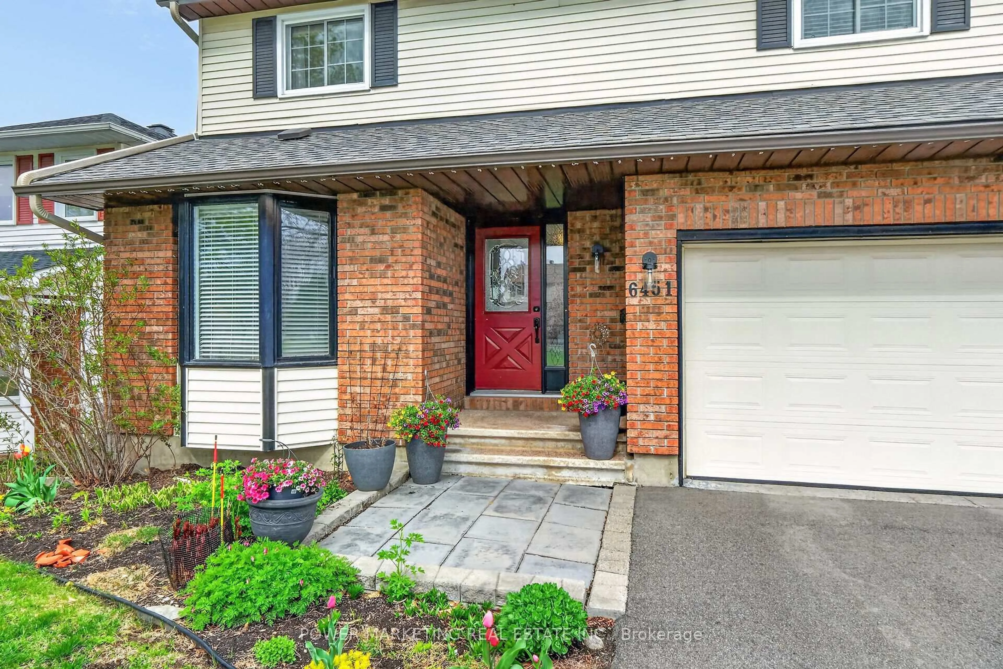 Home with brick exterior material, street for 6451 VISENEAU Dr, Orleans Ontario K1C 5H1