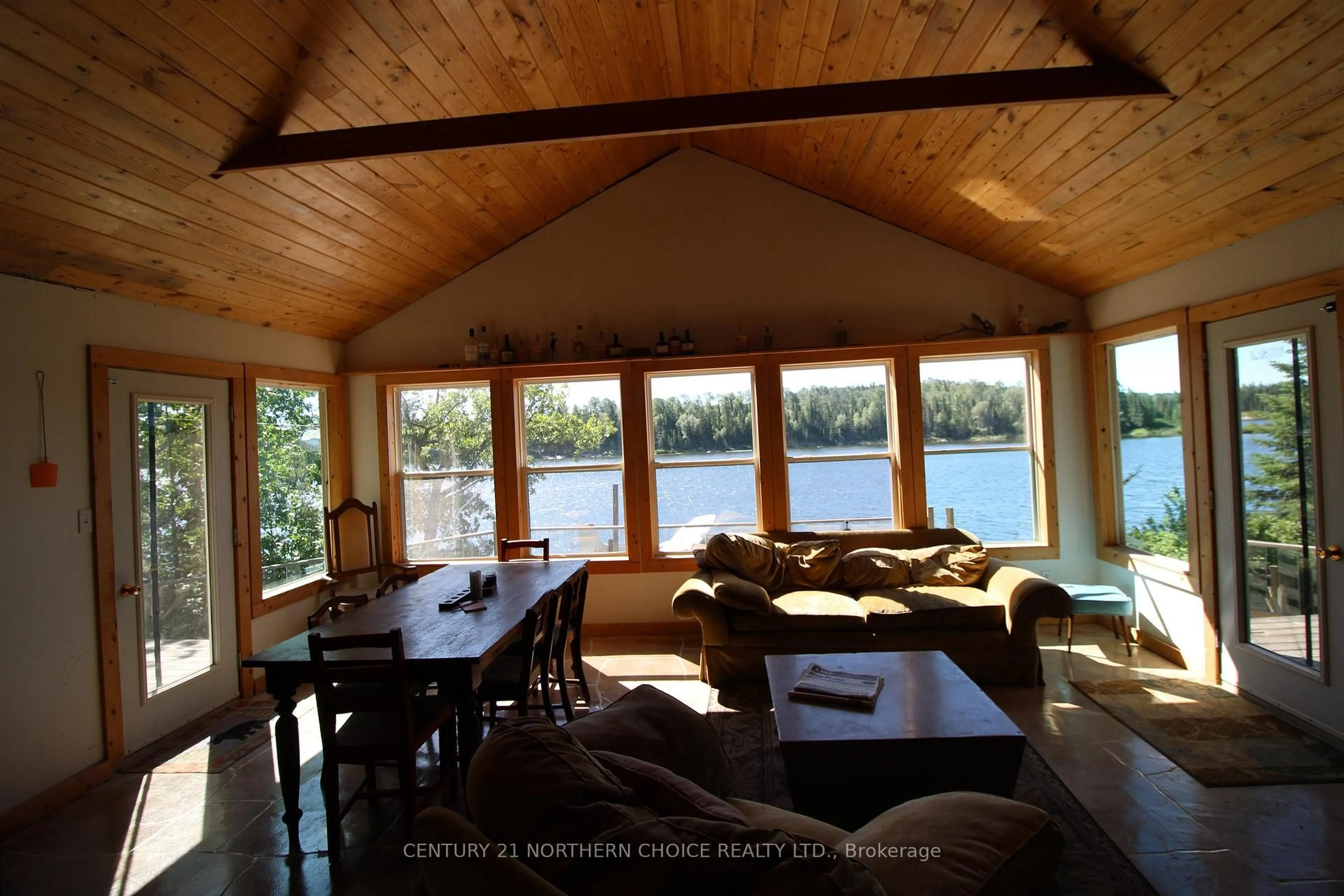 Dining room, wood/laminate floor for PCL 5059 Gunn Lake, Kenora Remote Area Ontario P0X 1J0