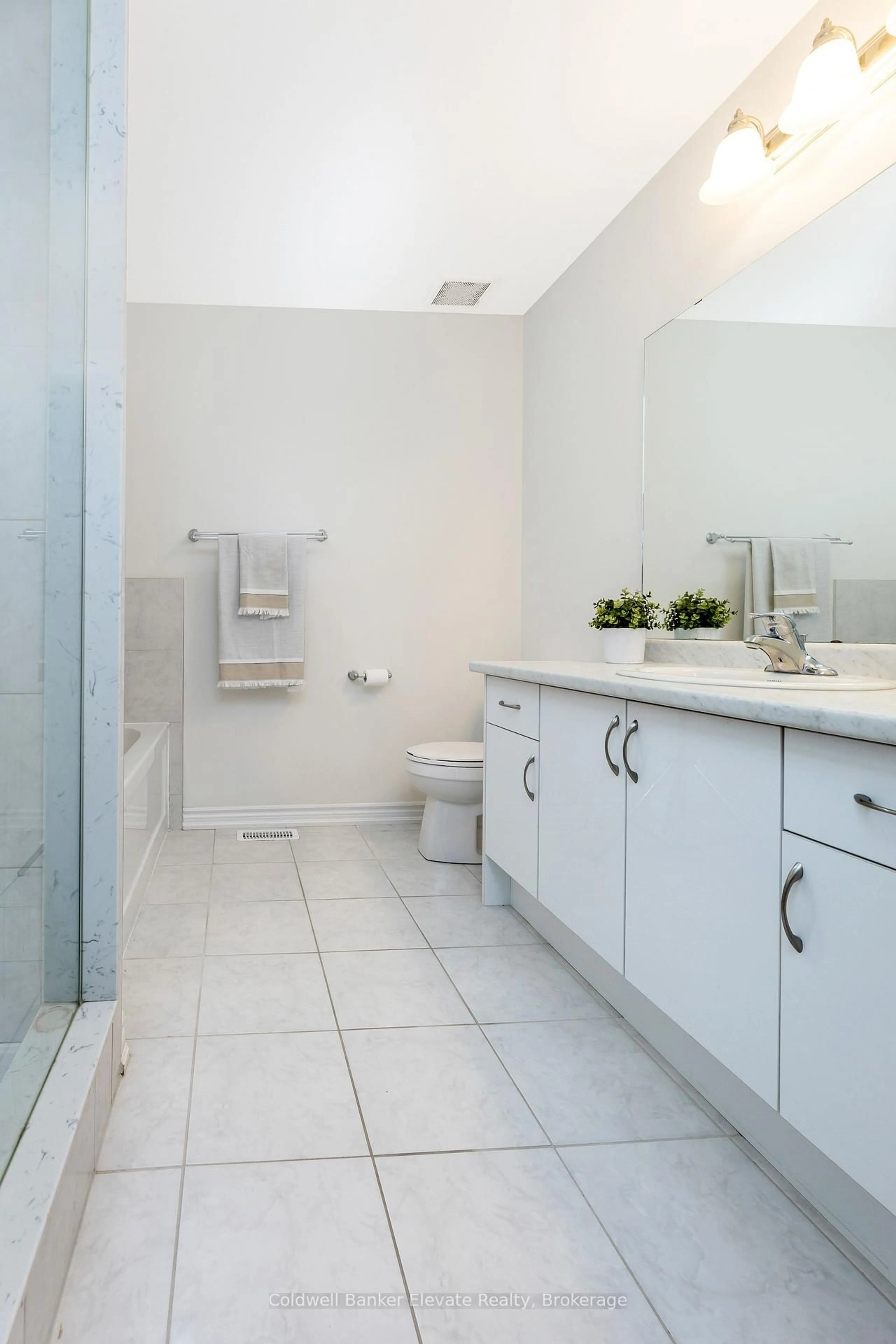 Standard bathroom, ceramic/tile floor for 108 Flagg Ave, Brant Ontario N3L 0J8