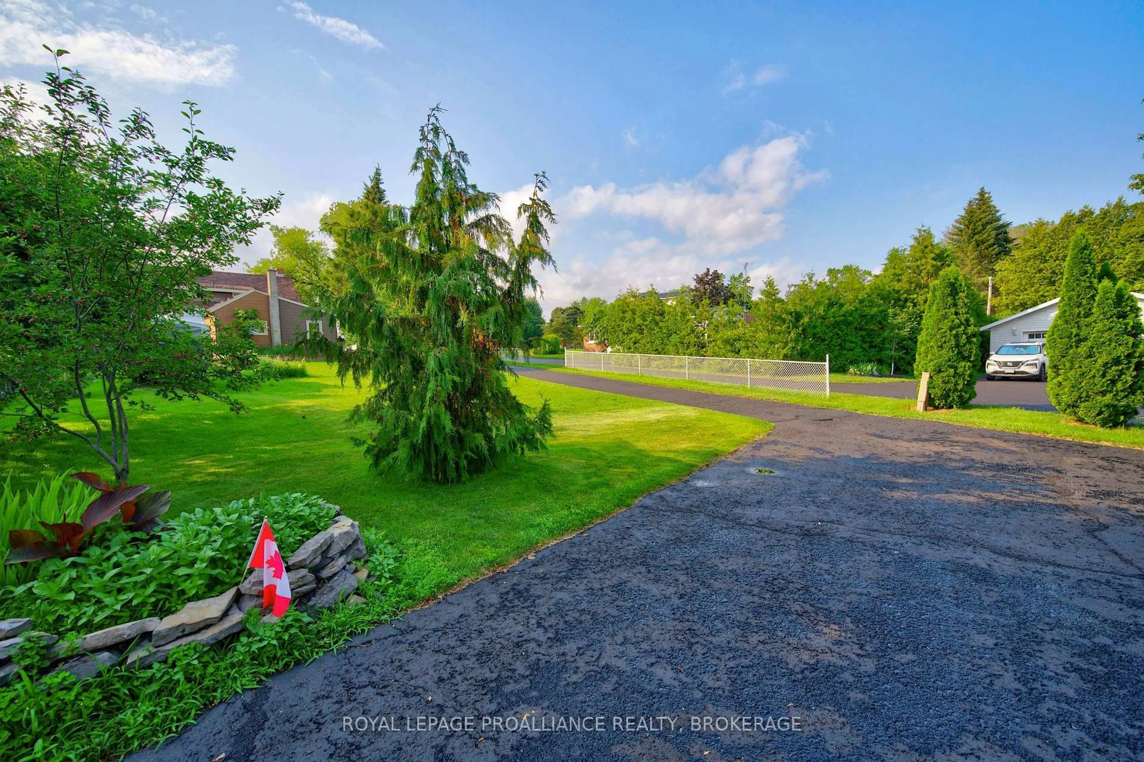 A pic from outside/outdoor area/front of a property/back of a property/a pic from drone, unknown for 535 Main St, Bath Ontario K0H 1G0