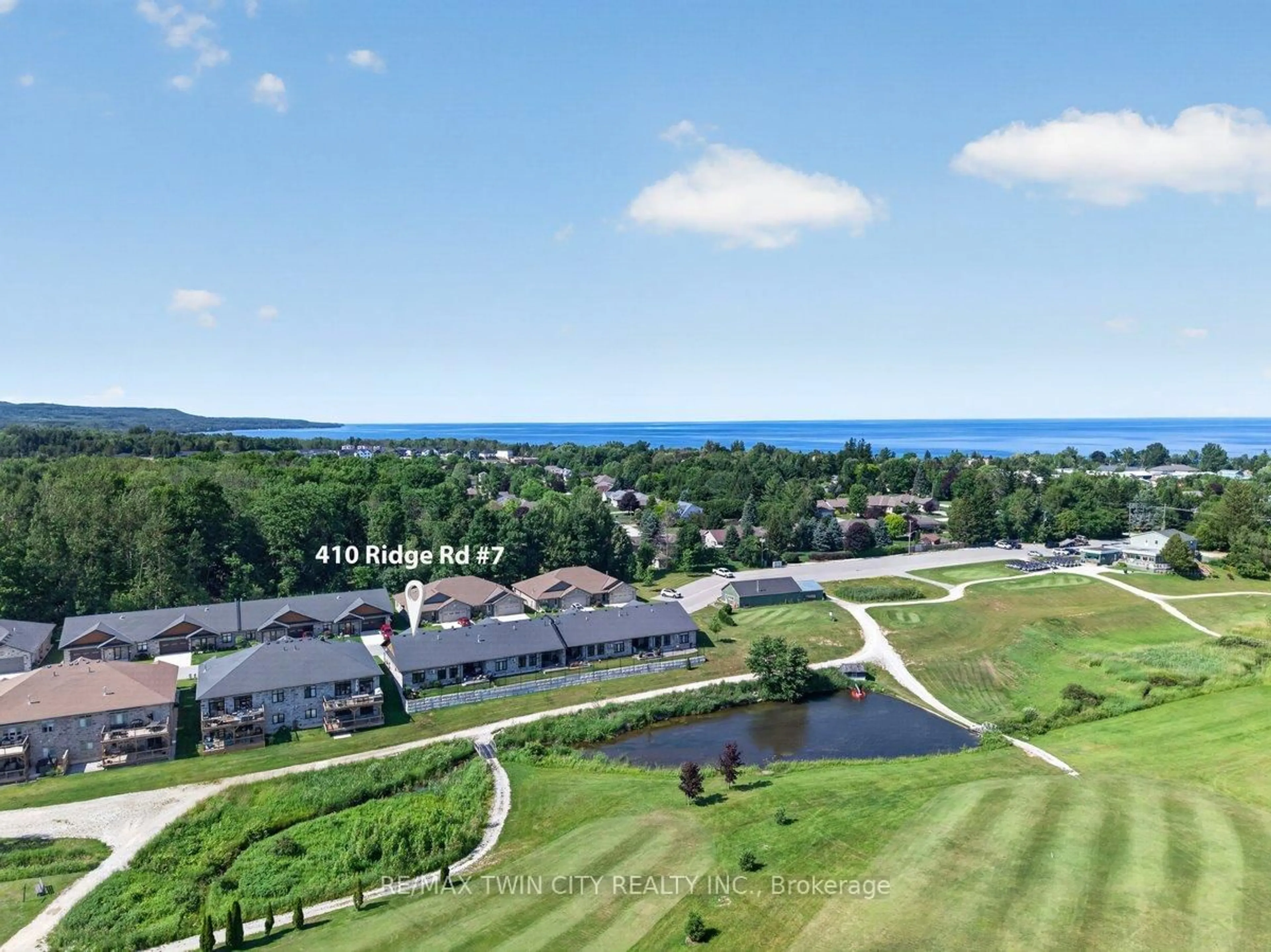 A pic from outside/outdoor area/front of a property/back of a property/a pic from drone, water/lake/river/ocean view for 410 Ridge Rd #7, Meaford Ontario N4L 0B2