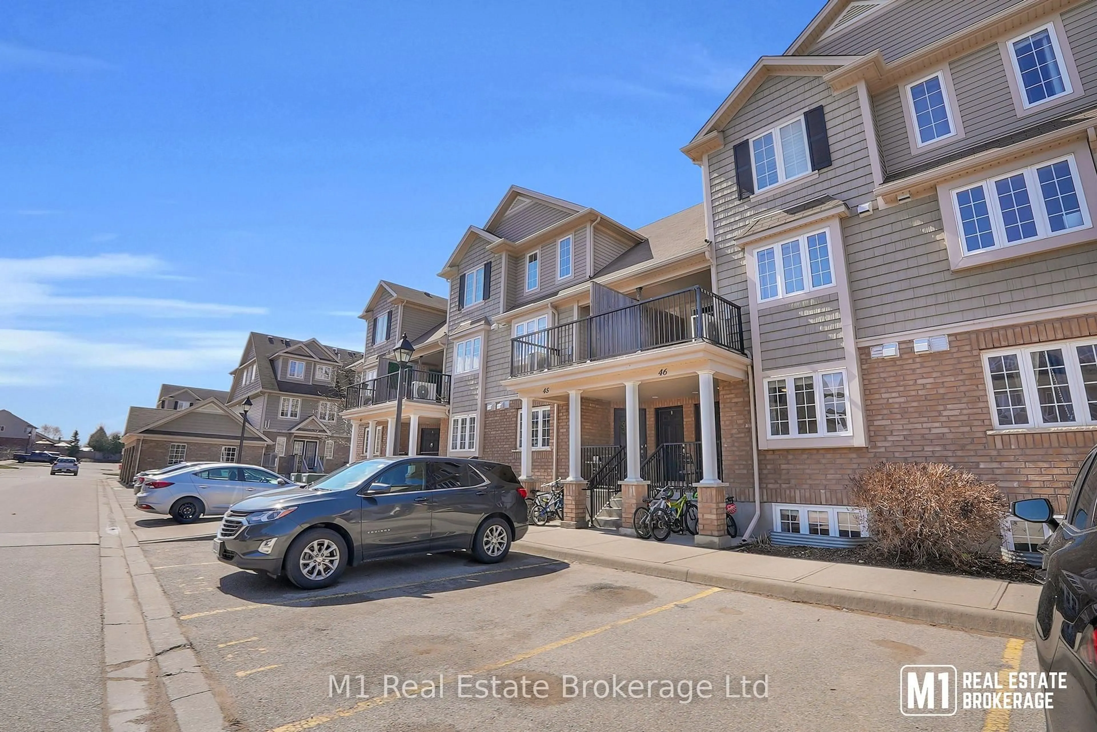 A pic from outside/outdoor area/front of a property/back of a property/a pic from drone, street for 15 Carere Cres #46B, Guelph Ontario N1E 0K4