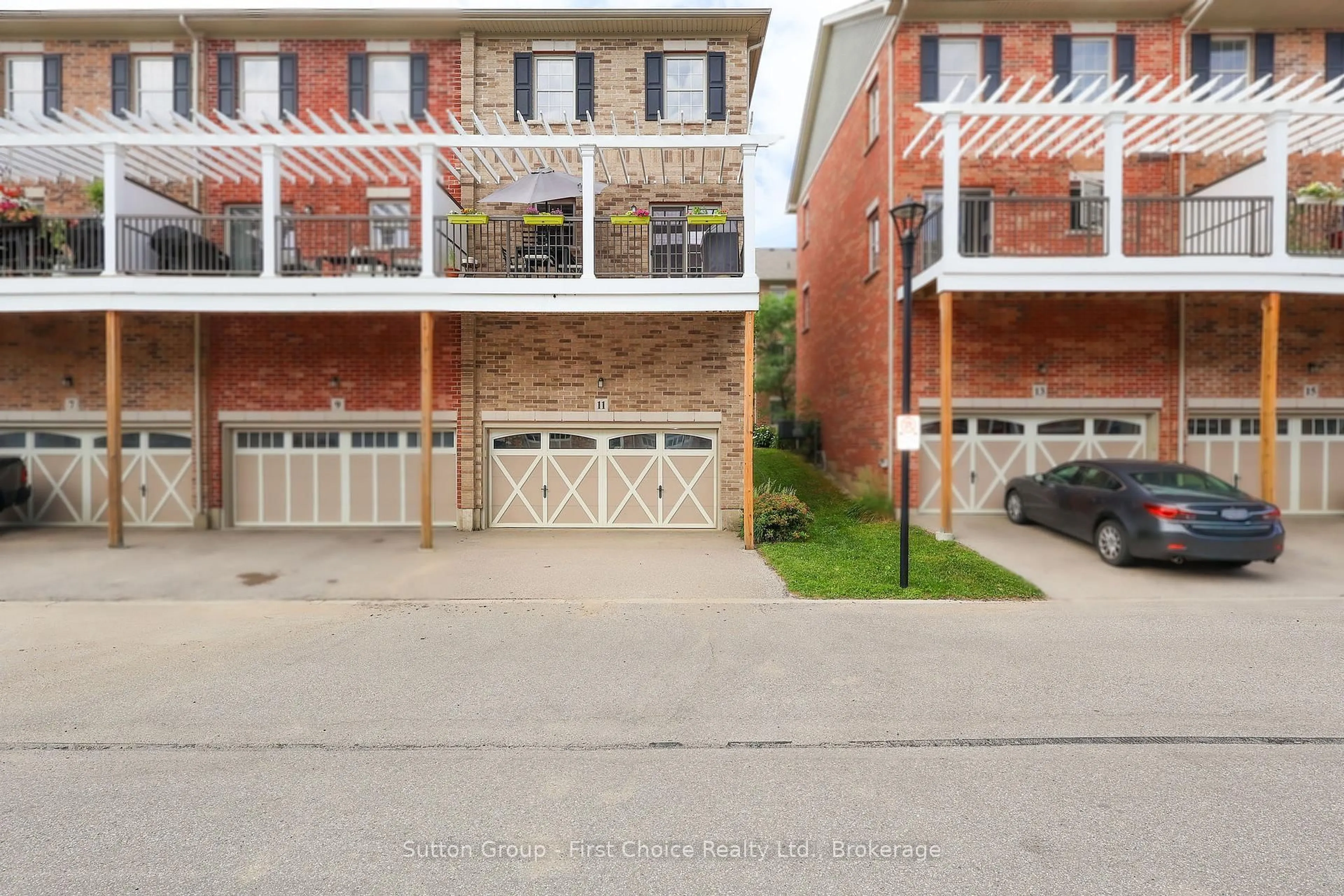 Home with brick exterior material, street for 11 John Russell Lane, Kitchener Ontario N2H 0B4