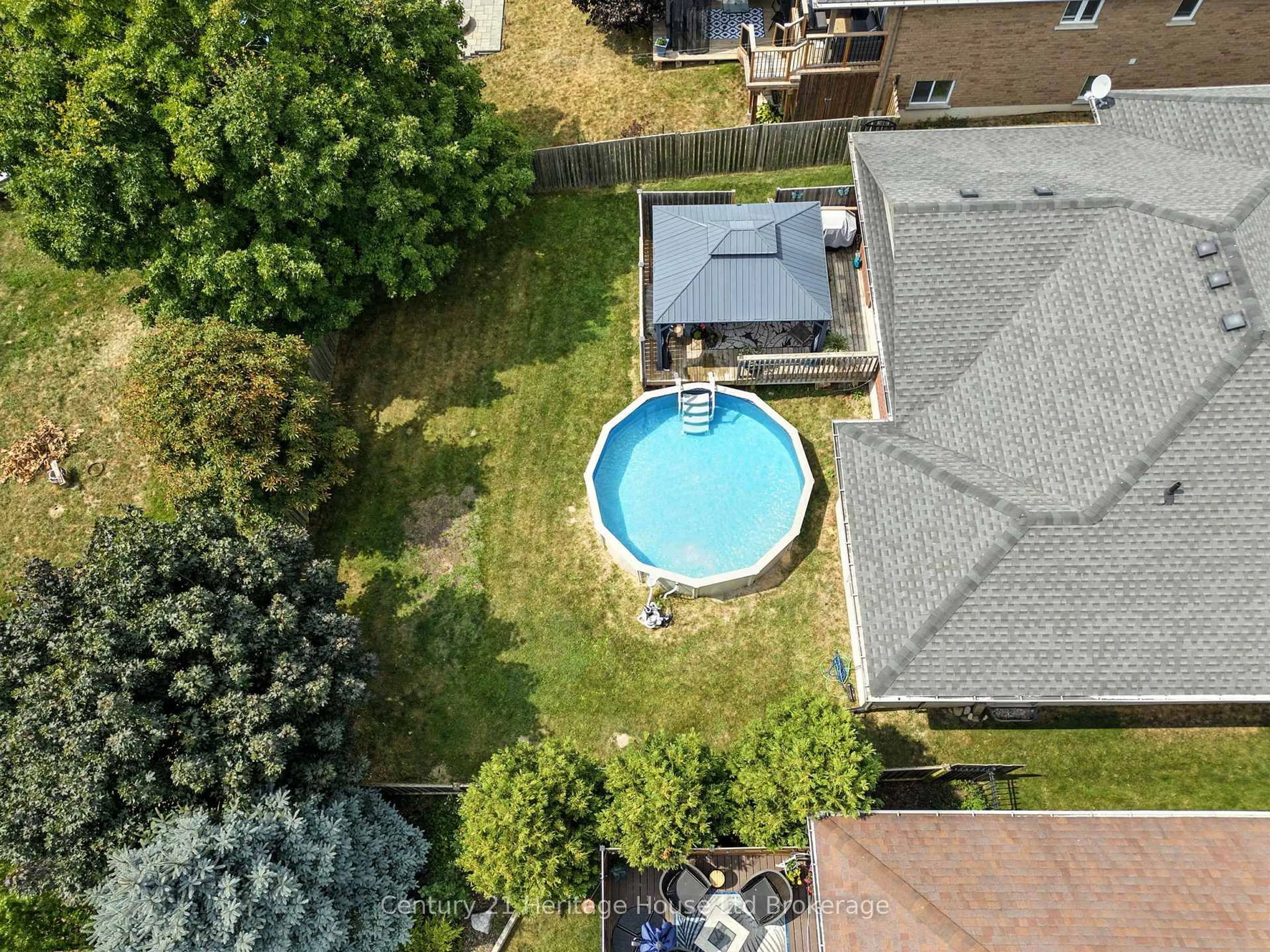 A pic from outside/outdoor area/front of a property/back of a property/a pic from drone, water/lake/river/ocean view for 107 Applewood St, Blandford-Blenheim Ontario N0J 1S0