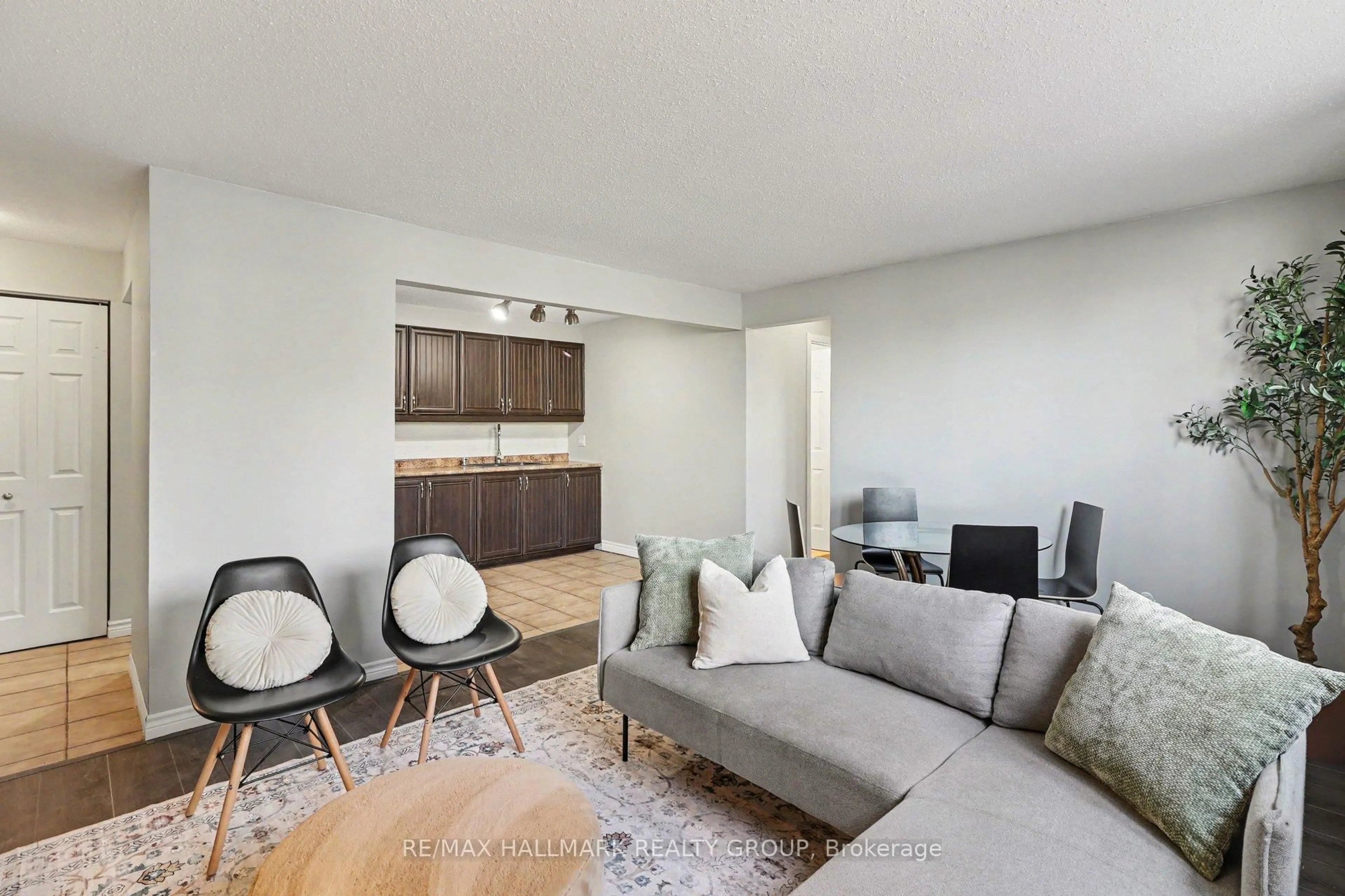 Living room with furniture, unknown for 898 Elmsmere Rd #2, Ottawa Ontario K1J 7T6
