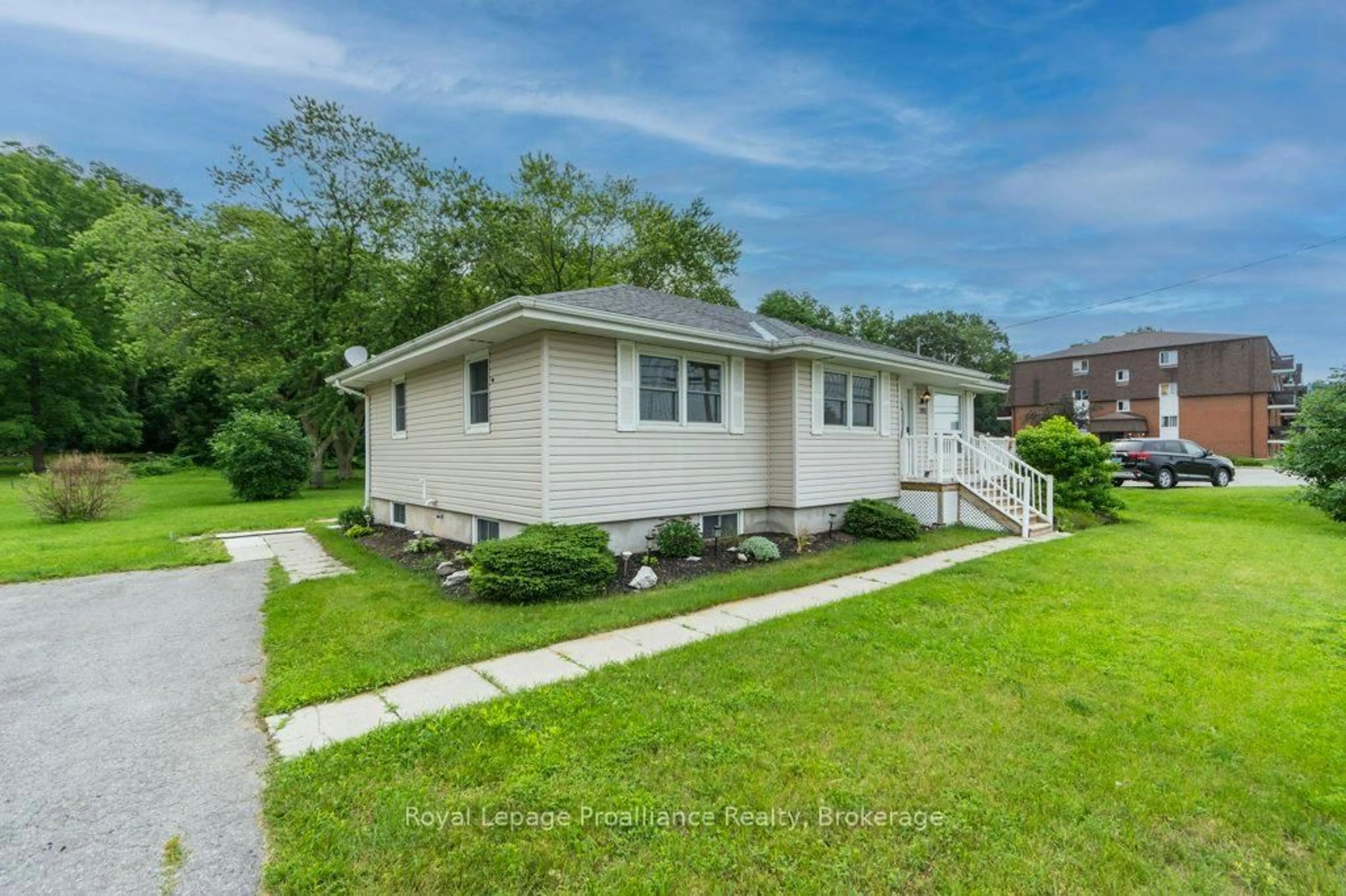 Home with vinyl exterior material, street for 395 Sidney St, Quinte West Ontario K8V 6N6