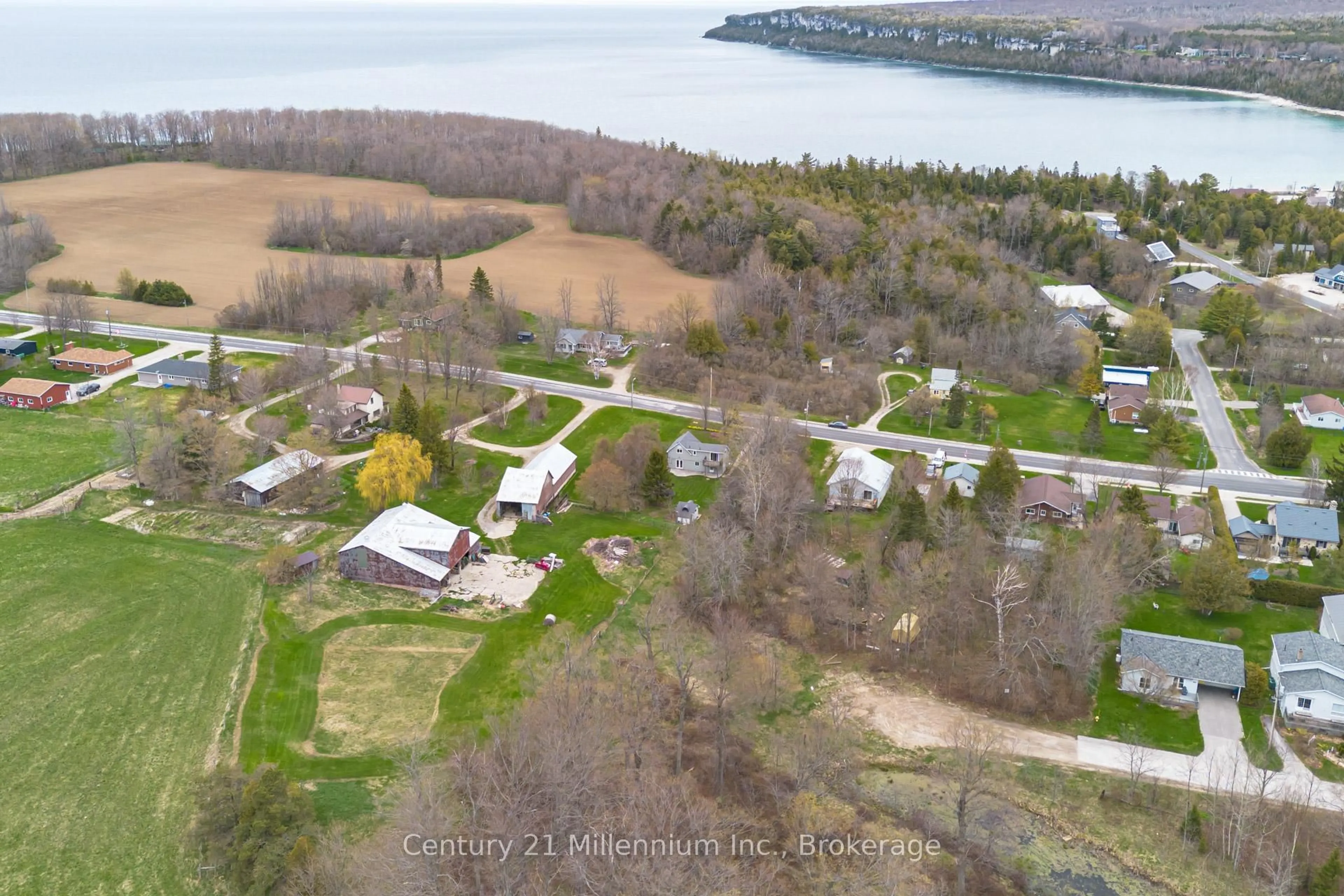 A pic from outside/outdoor area/front of a property/back of a property/a pic from drone, water/lake/river/ocean view for 124 MAIN St, Northern Bruce Peninsula Ontario N0H 1W0