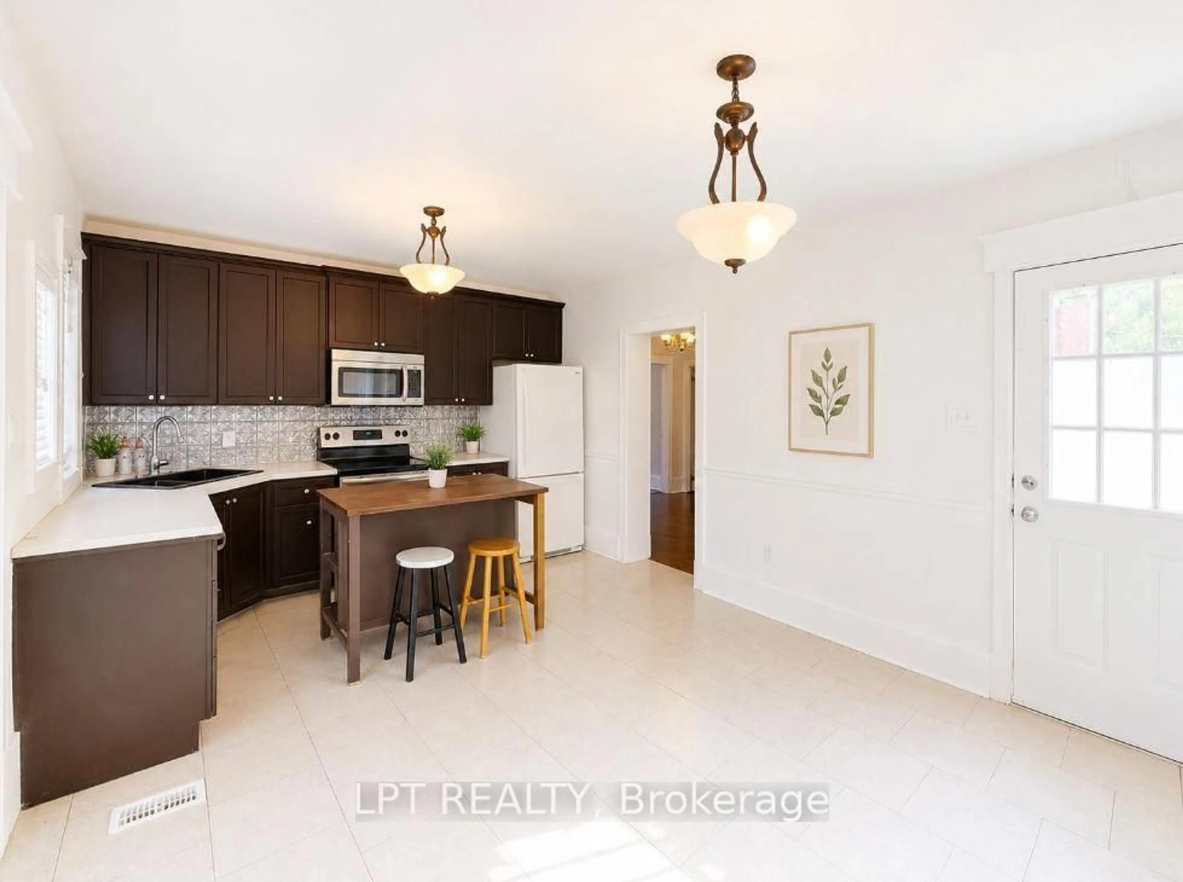 Open concept kitchen, ceramic/tile floor for 219 Erie Ave, Brantford Ontario N3S 2H1