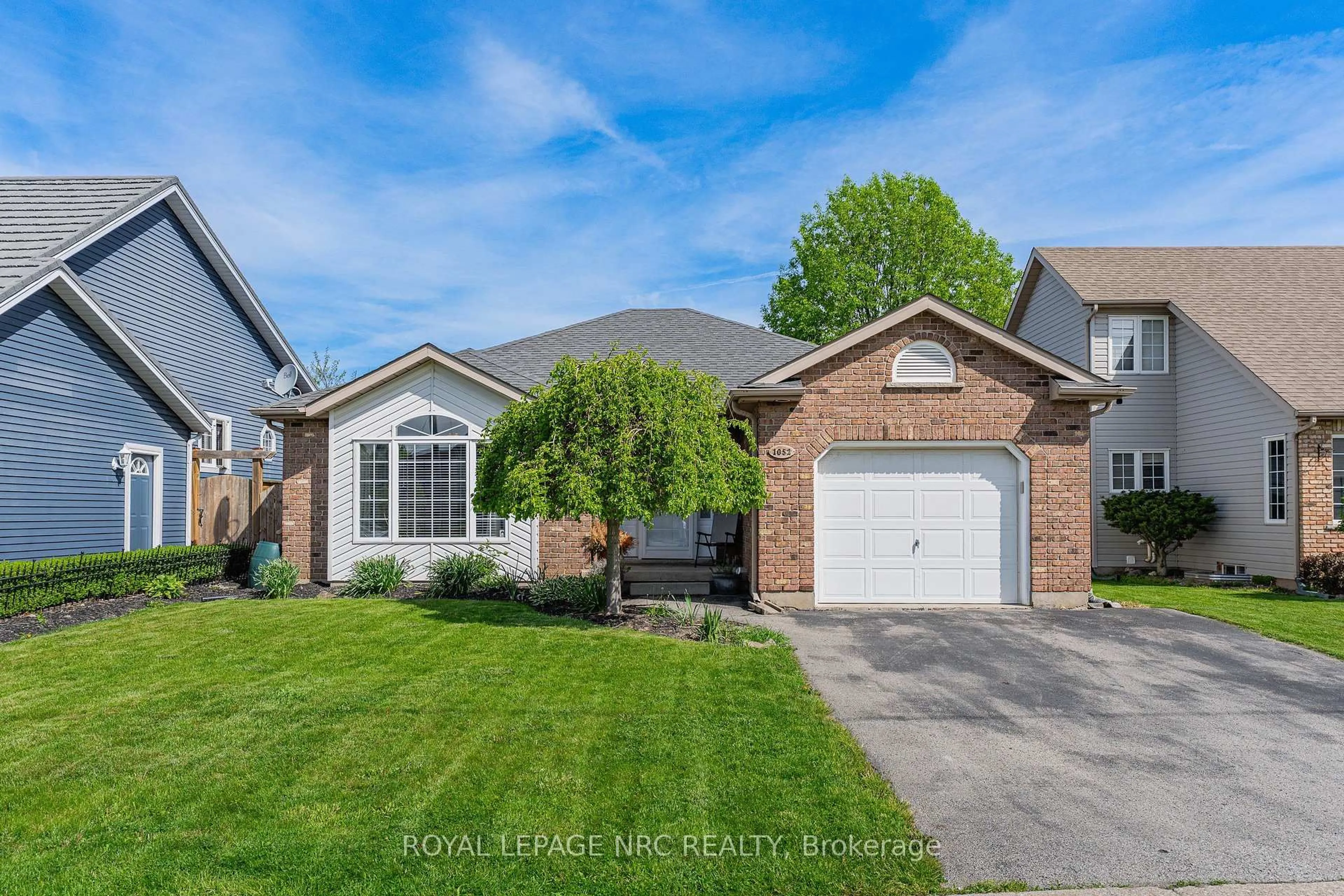 Home with brick exterior material, street for 1052 Vansickle Rd, St. Catharines Ontario L2S 2X3