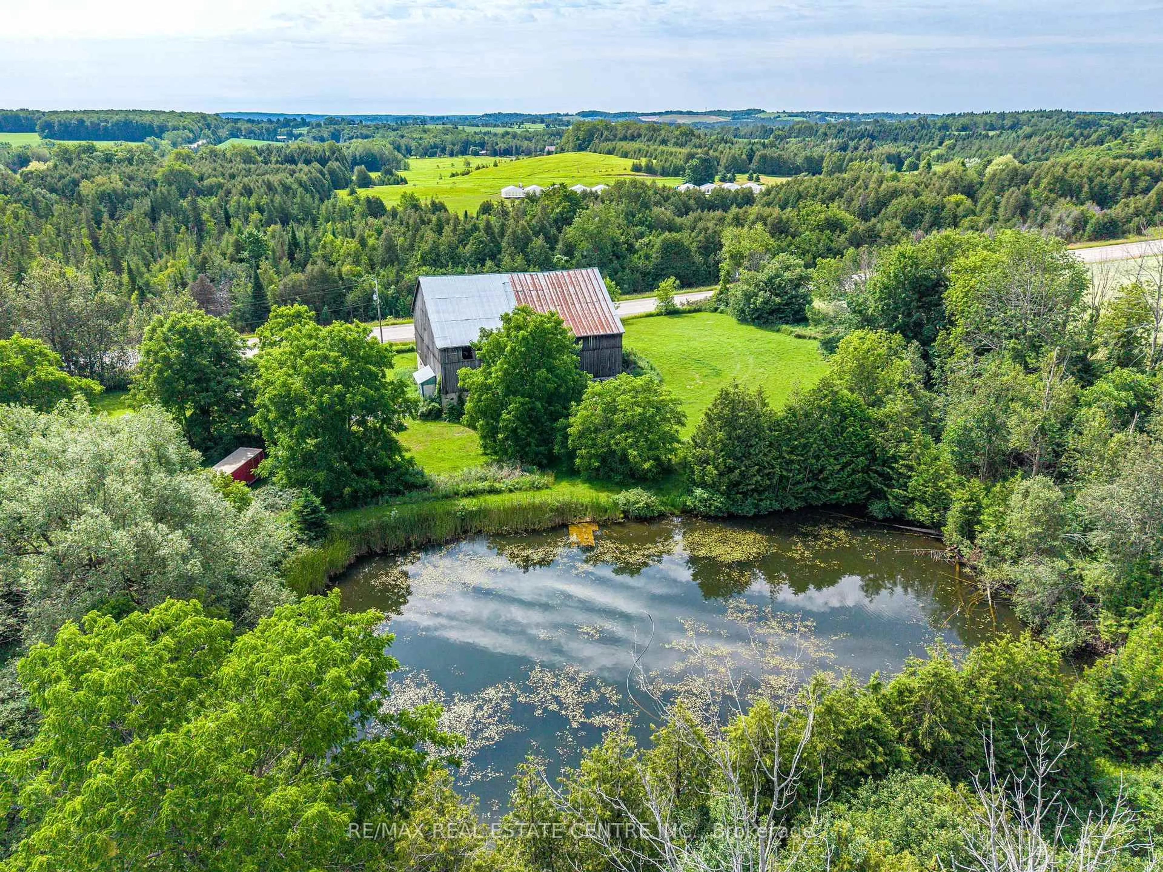 A pic from outside/outdoor area/front of a property/back of a property/a pic from drone, water/lake/river/ocean view for 9572 Wellington 22 Rd, Erin Ontario N0B 1T0