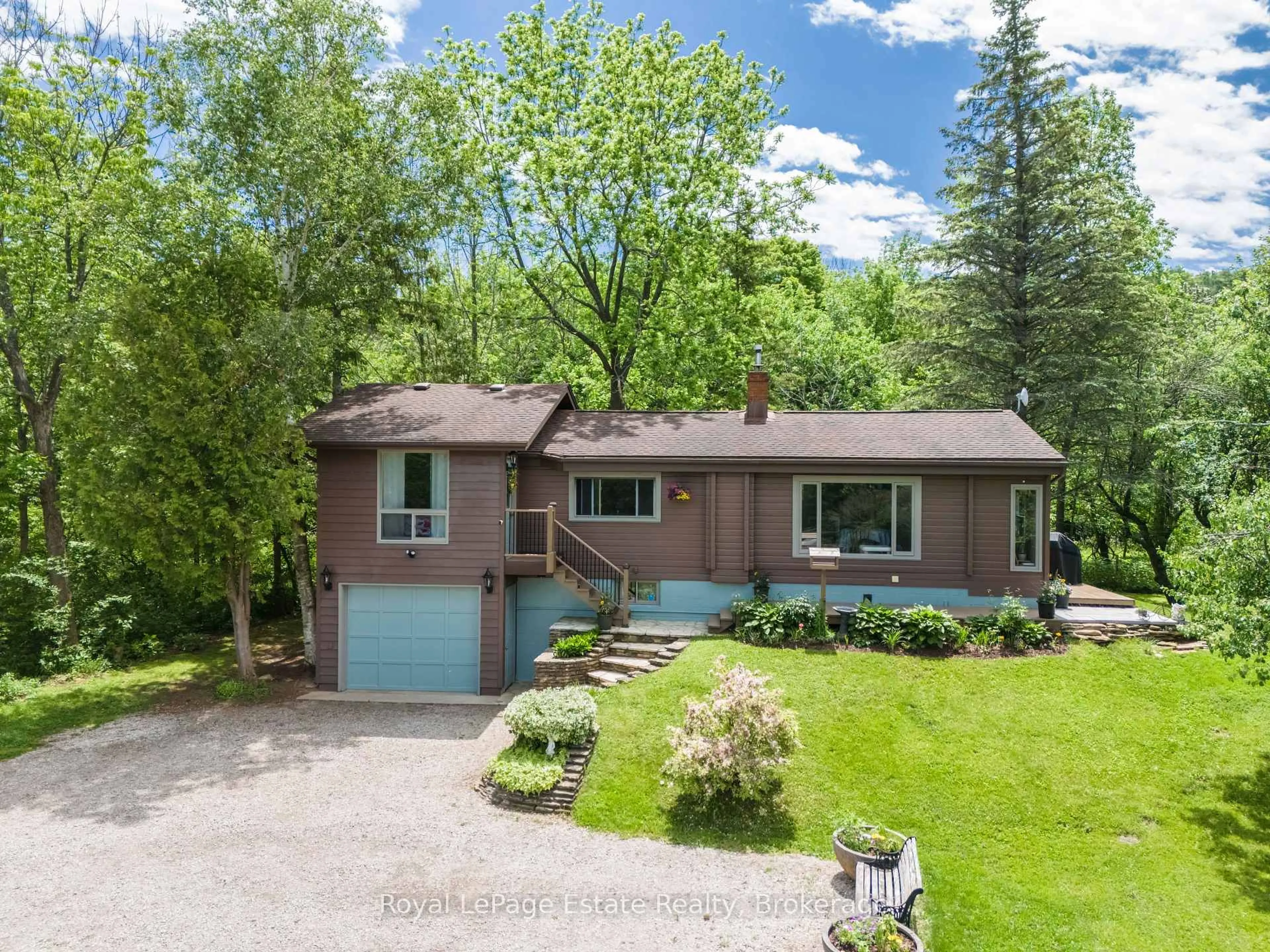 A pic from outside/outdoor area/front of a property/back of a property/a pic from drone, street for 502788 Grey Road 1, Georgian Bluffs Ontario N0H 2T0